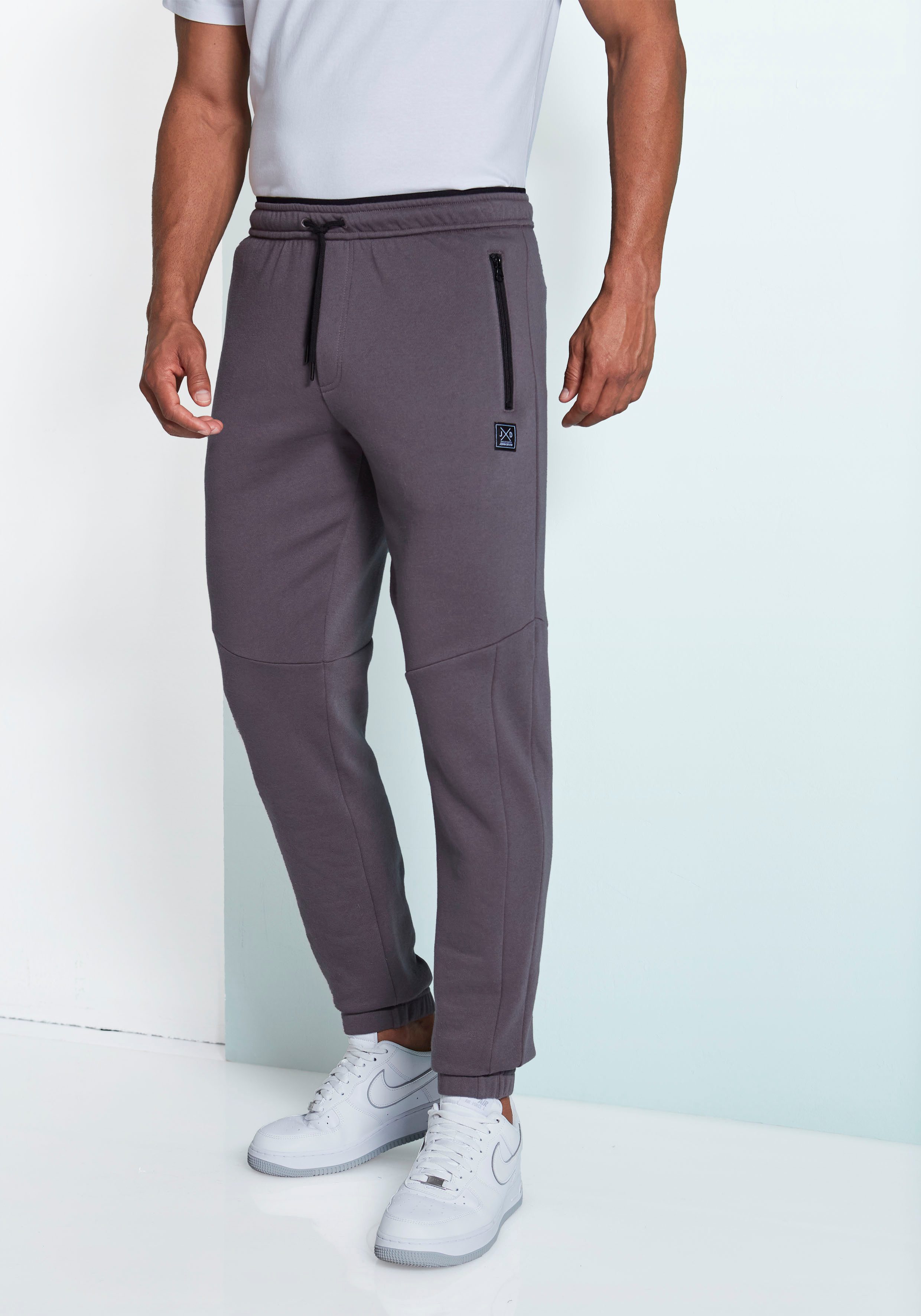 John Devin Sweathose Jogginghose mit seitlichen Taschen und Bindeband aus Baumwoll-Mix