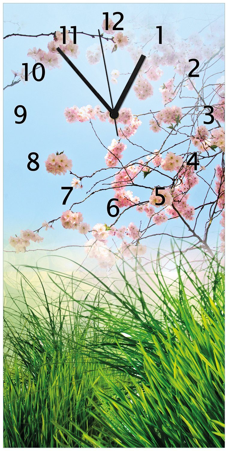 Wallario Wanduhr Kirschblütenzweige und grüne Wiese- Frühling (Uhr aus Acryl)
