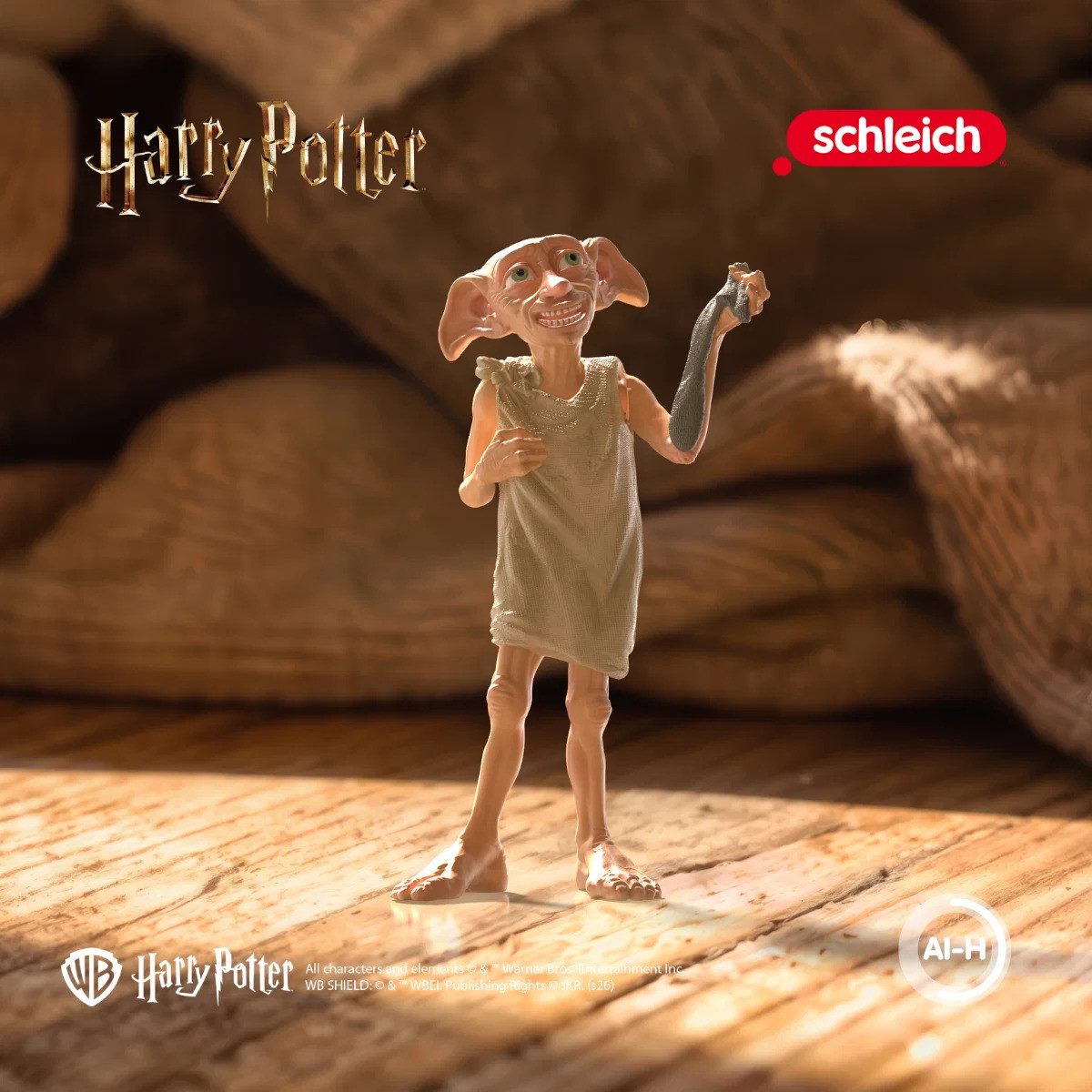 Schleich® Spielfigur HARRY POTTER™, Dobby™ mit Socke (14940)