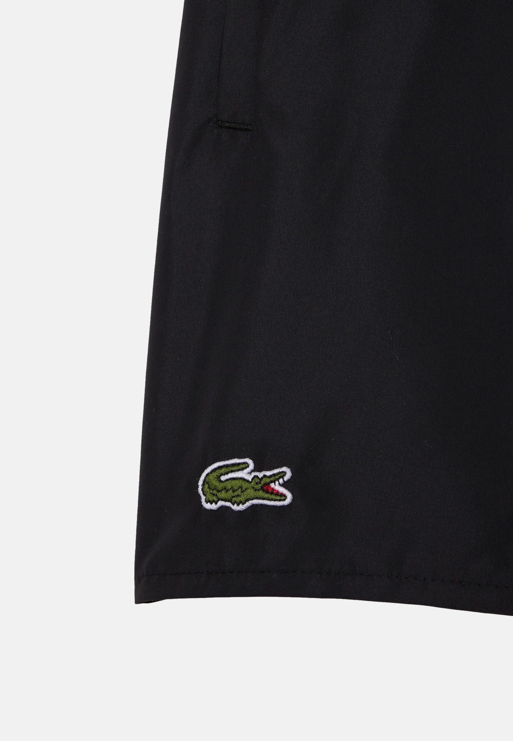 Lacoste Badeshorts Badehose Bade-Shorts mit Taschen, Mesh-Futter und (1-St)