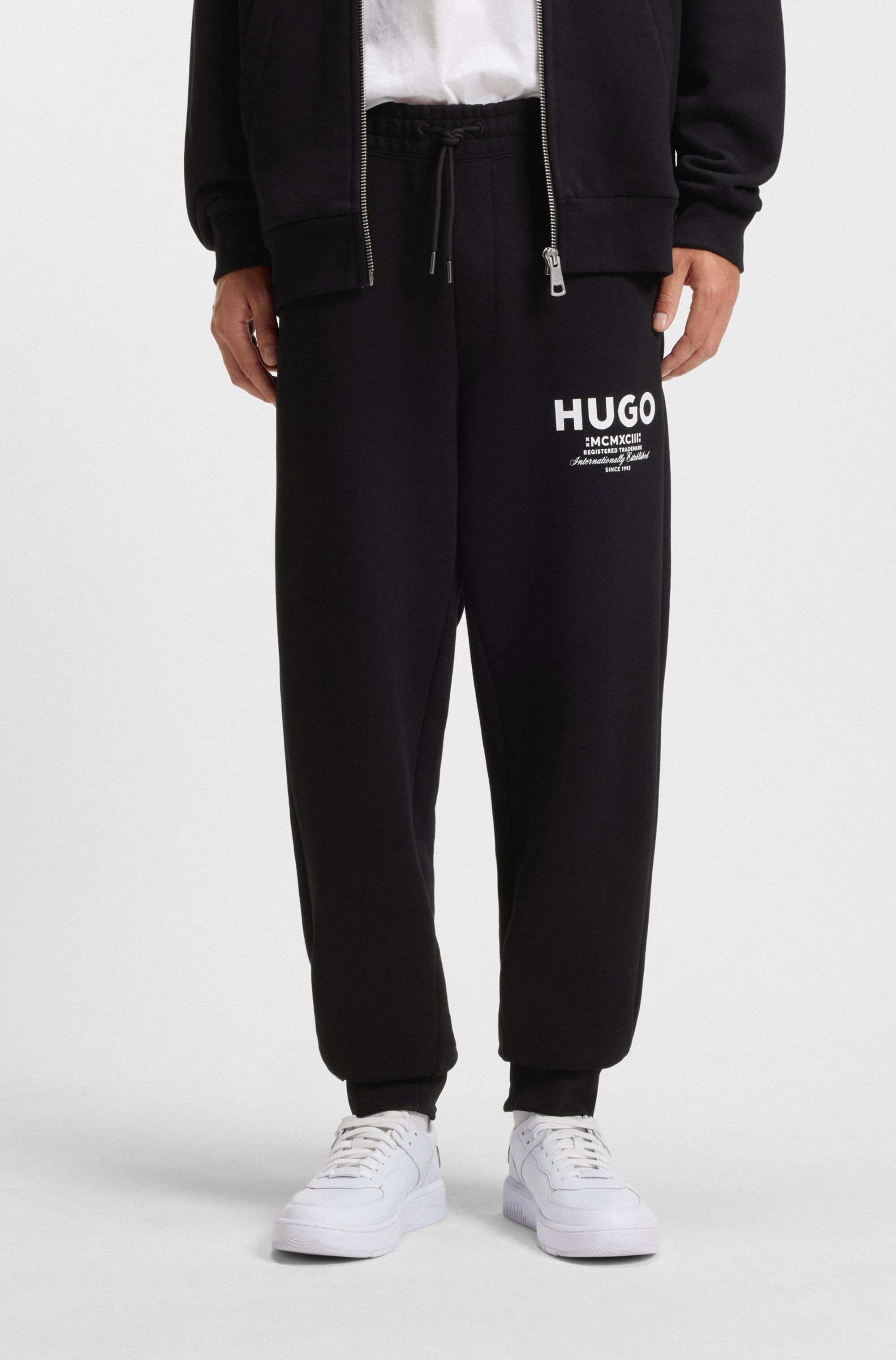 HUGO Blue Jogginghose Nevez mit Beinbündchen und Oversize-Passform günstig online kaufen