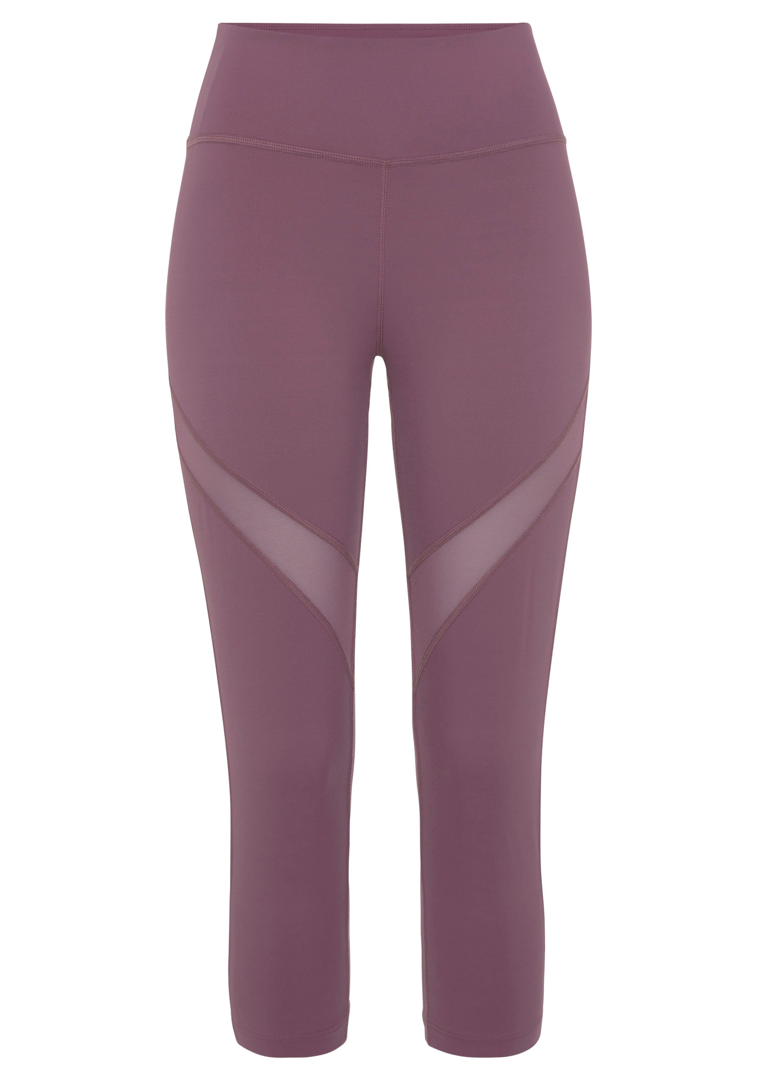 Caprileggings Raffung, -Sport LASCANA lila kleiner ACTIVE mit Capri Loungewear