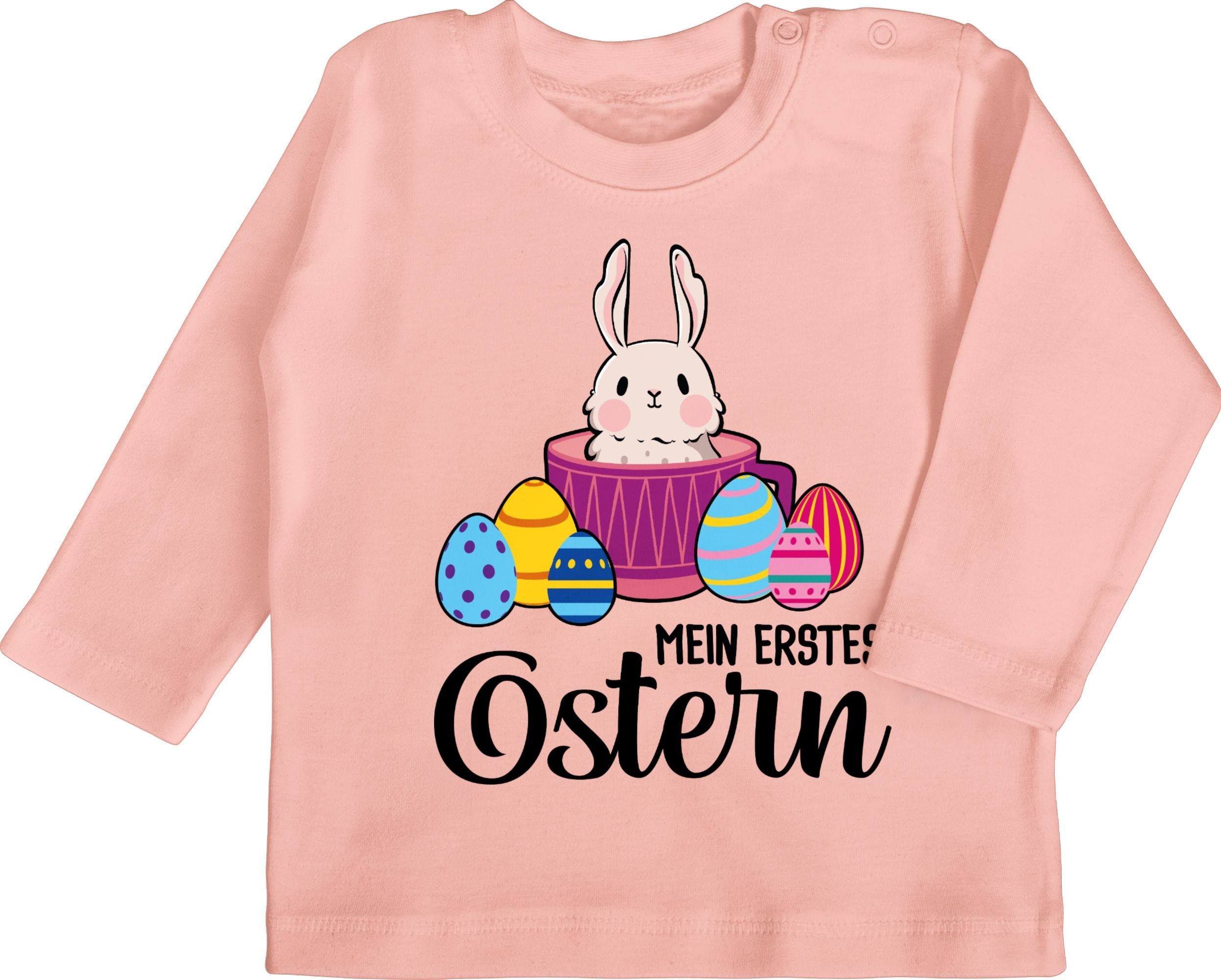 Shirtracer T-Shirt Mein erstes Ostern - Hase in Tasse - schwarz Ostergeschenke 1 Babyrosa | T-Shirts