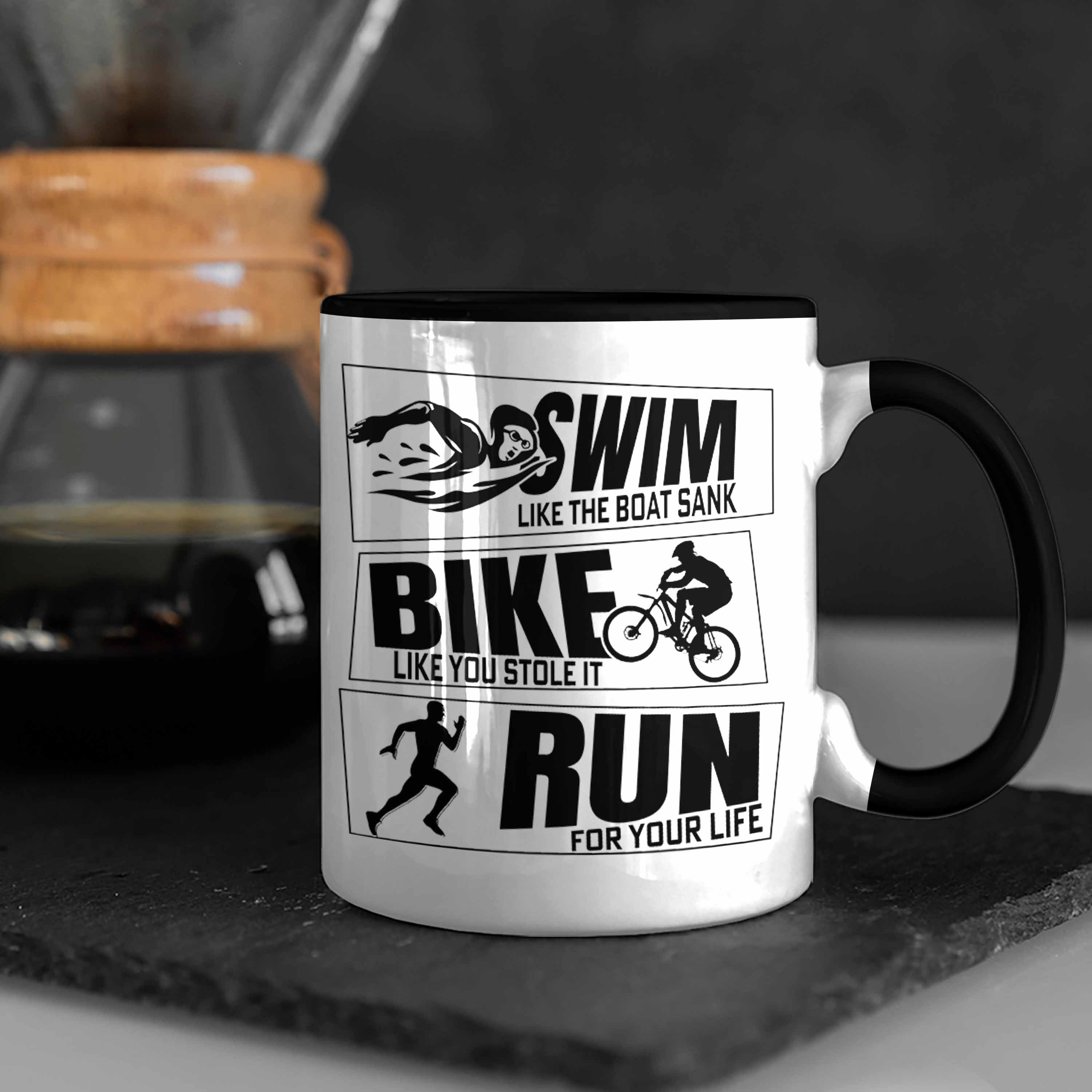 Trendation Tasse Geschenkidee Sportl Schwarz Tasse Bike Geschenk Triathlon Spruch Swim für Run