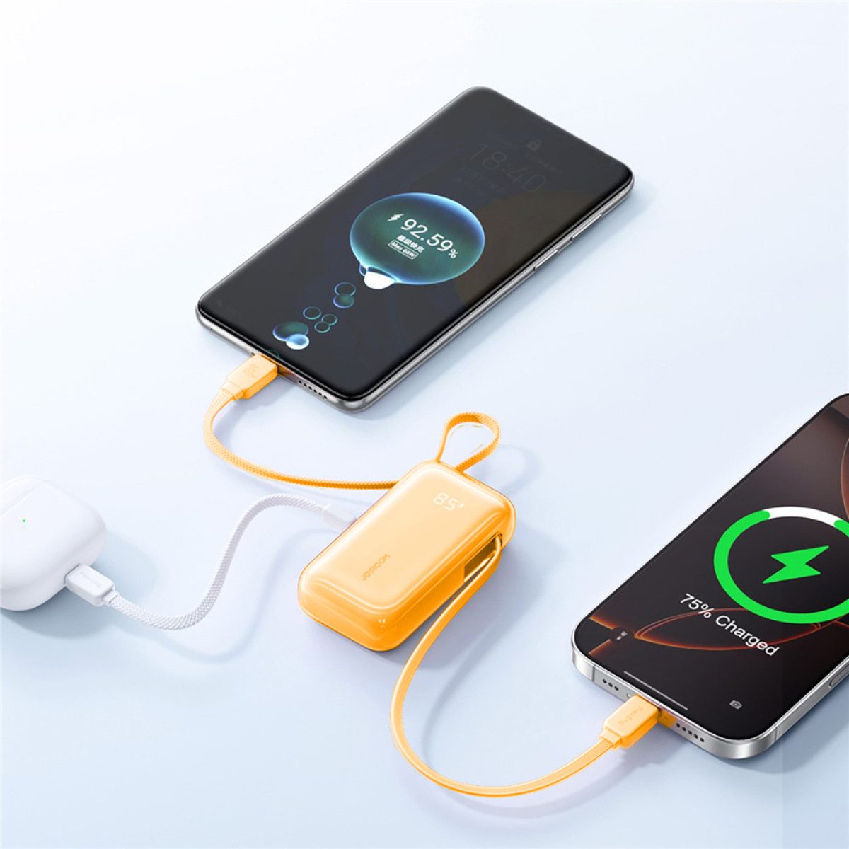 JOYROOM JR-PR2L Orange Powerbank 10000 mAh (12, 15, 5, 9, 20, 10 V), Powerbank mit integrierten Kabeln und LED Display