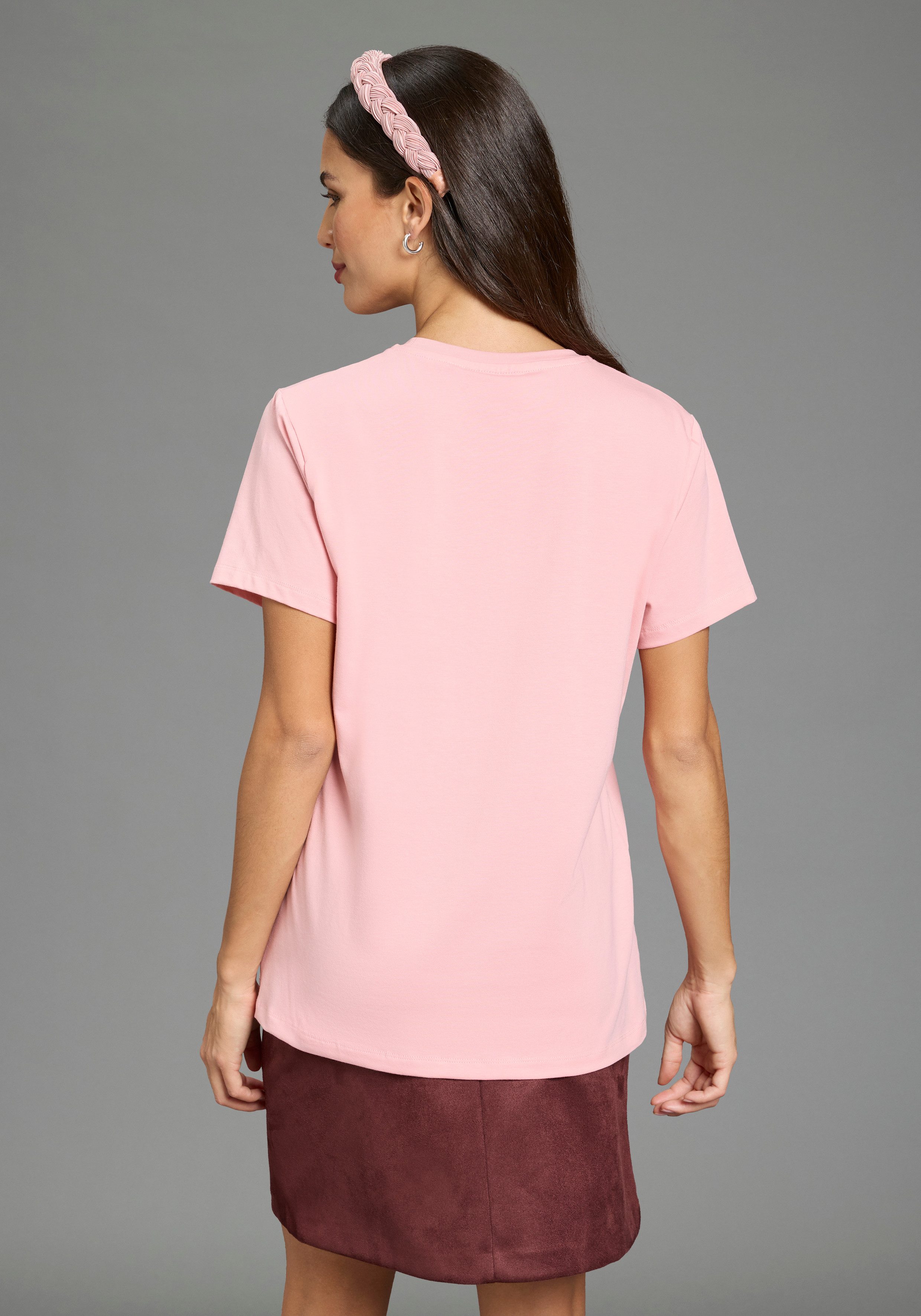 Laura Scott T-Shirt BARBIE Glitzerdruck T-Shirt, Mattel BARBIE Nussknacker Style, schmale Passform, Kurzarm, modischer Stil. € 29,99, (€ 29,99 pro 1 Stk).