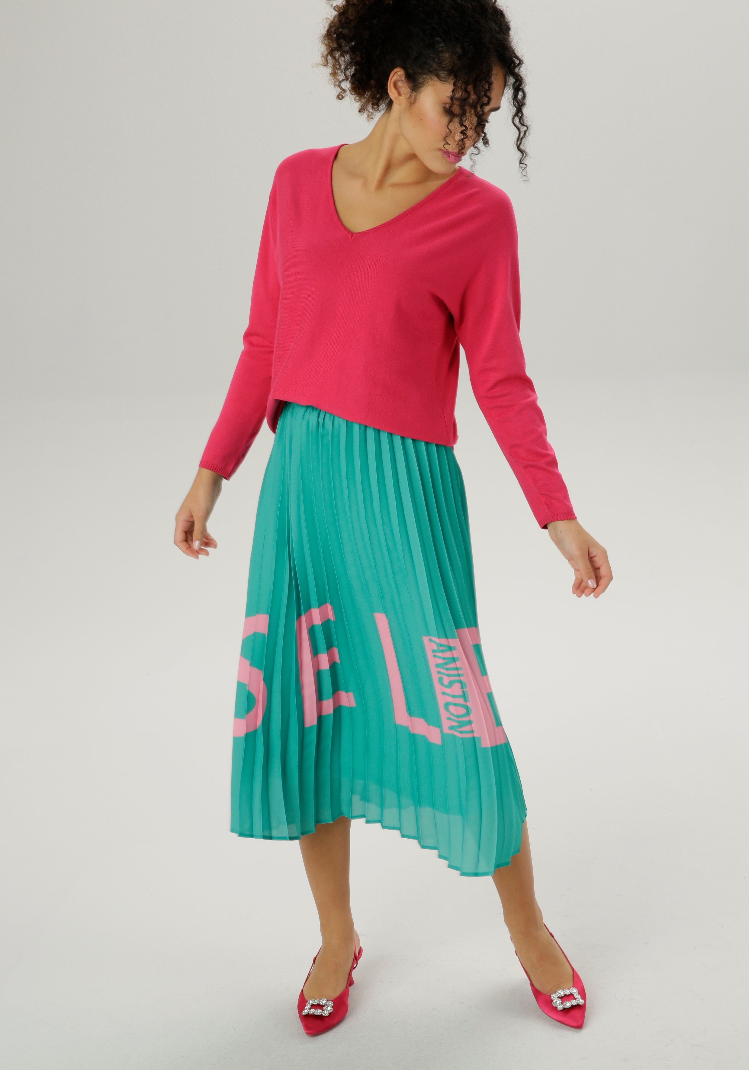 Aniston SELECTED Plisseerock mit Markenschriftzug Knallfarbe grün-pink in