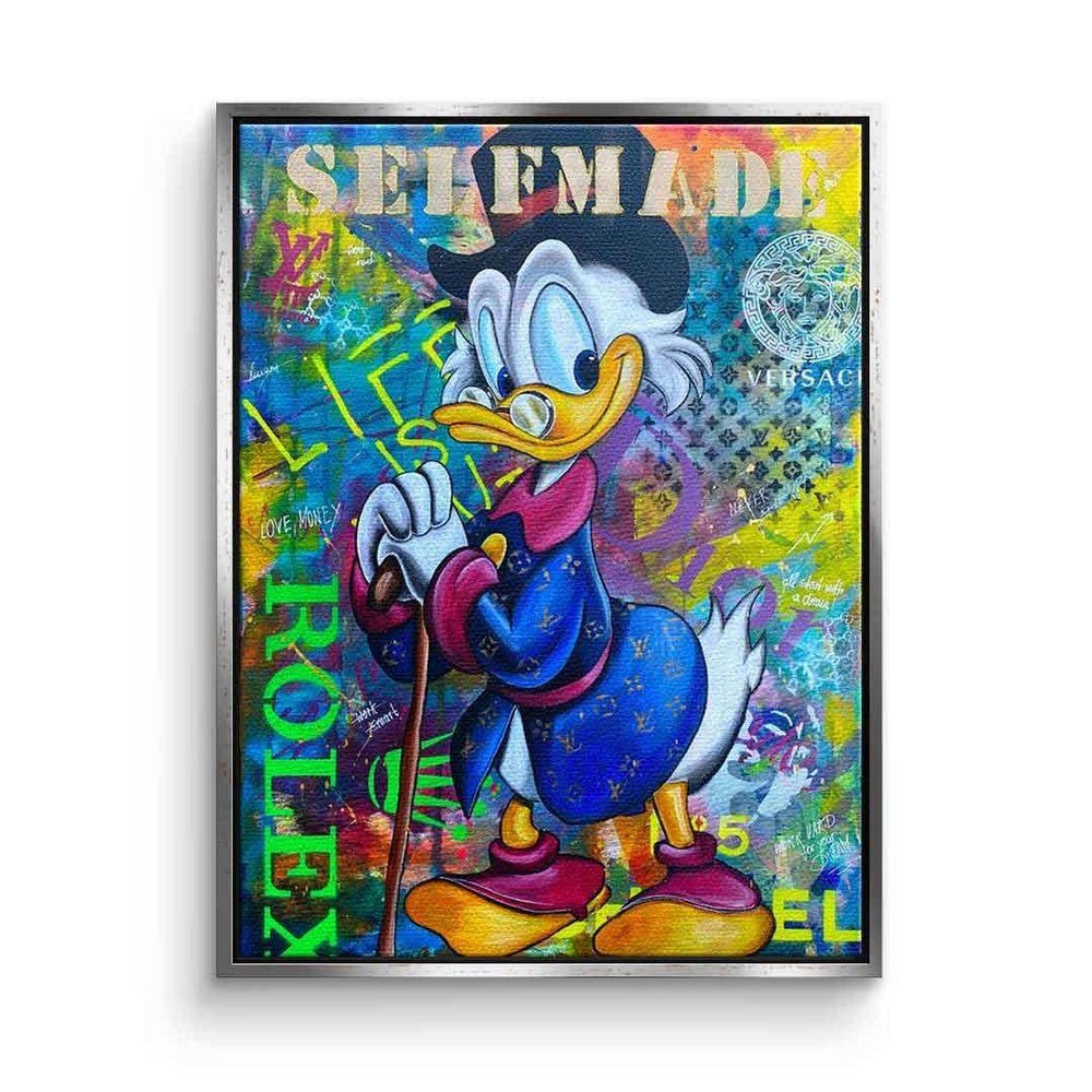 DOTCOMCANVAS® Leinwandbild $elfmade, Leinwandbild $elfmade Dagobert Duck Scrooge McDuck Comic Pop Art silberner Rahmen