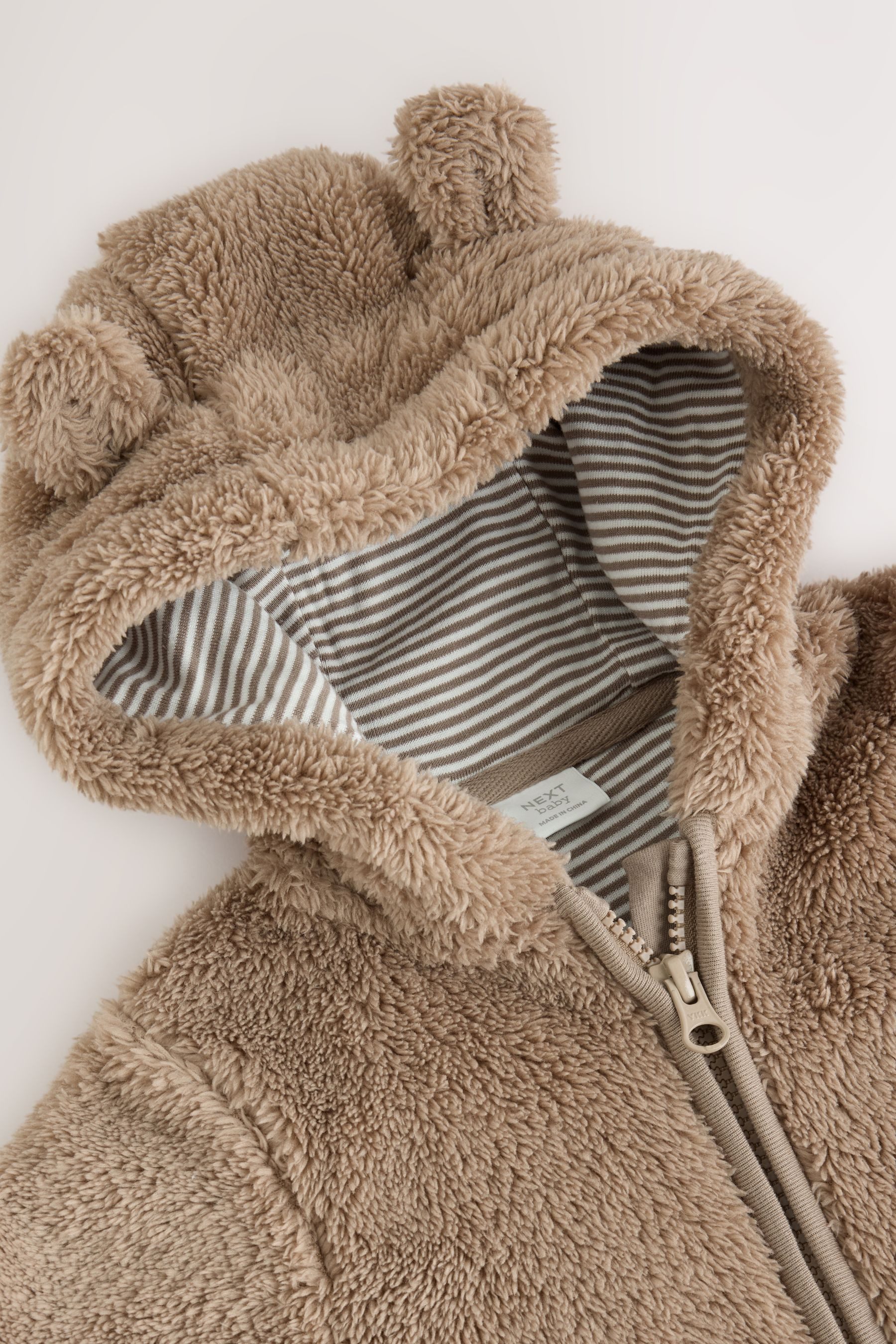 Next Fleeceoverall Gesteppter Baby-Einteiler mit Kapuze aus Polyamid (1-tlg) – Bild 5 von 5