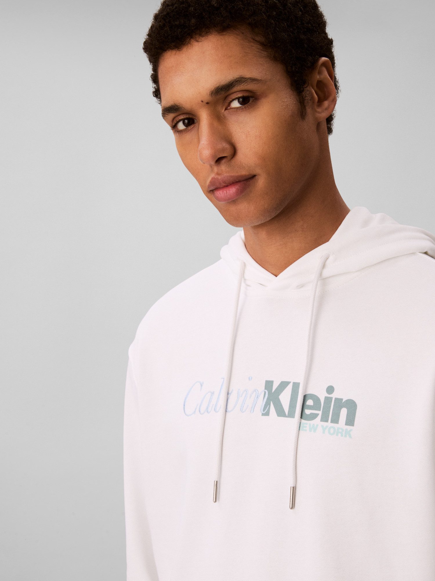 Calvin Klein Kapuzensweatshirt LS EU 350TERRY CURSIVE GRAPHIC H regular fit, Logo-Schriftzug