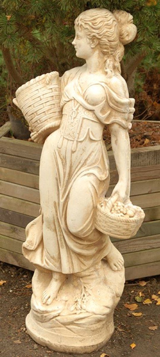 Casa Padrino Skulptur Jugendstil Gartendeko Skulptur Mädchen mit Körben Sandfarben / Beige 50 x 37 x H. 136 cm - Garten & Terrassen Deko Accessoires