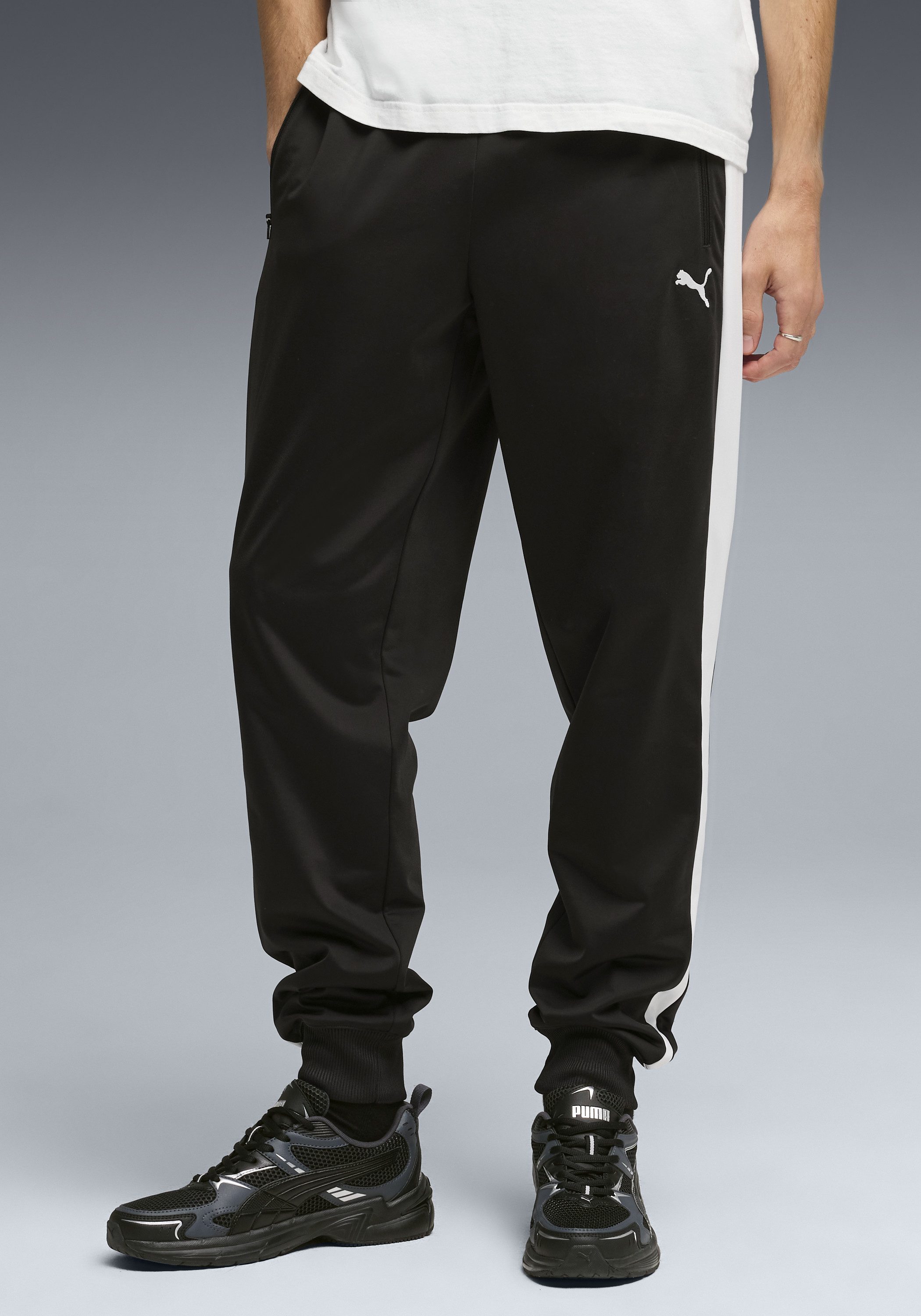 PUMA Trainingshose T7 FOUNDATION CL POLY KNITTED PANTS mit Eingrifftaschen, Regular Fit, sportlicher Stil