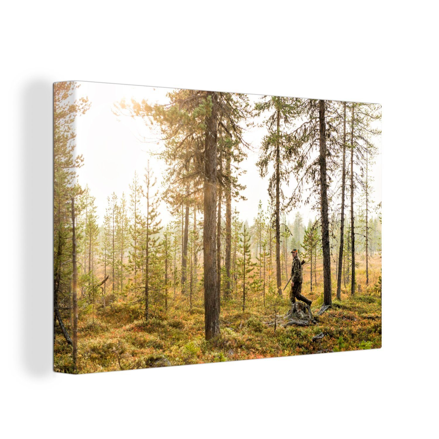 OneMillionCanvasses® Leinwandbild Ein Mann ist auf der Jagd im Wald, (1 St), Wandbild Leinwandbilder, Aufhängefertig, Wanddeko, 30x20 cm