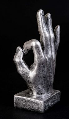 IDYL Dekofigur IDYL Moderne Skulptur Figur Resin "Finger o.k.", Moderne Figur "Finger o.k". Durch die Schlichtheit ein besonders gelungenes Dekorationsstück für den Wohnbereich. Dezent strukturierte und matte Oberfläche mit einem weichen Erscheinungsbild prägen den Charakter dieser Resinfigur. Der Artikel wird ohne Dekoration verkauft.