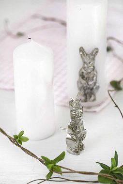 EDZARD Kerzenhalter Kerzenstecker Hase (4er-Set), Kerzenpin für Stumpenkerzen, Deko-Stecker für Kerzen, Kerzenbrosche zum Stecken, vernickelt