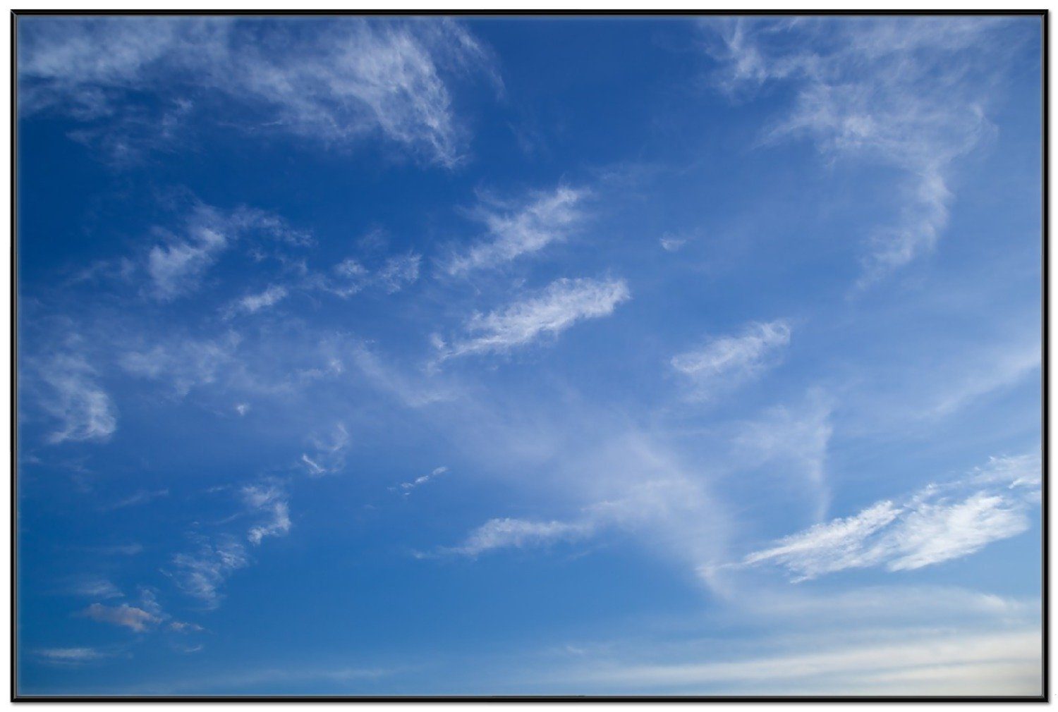 Wallario Poster, Blauer Himmel mit vereinzelten günstig online kaufen