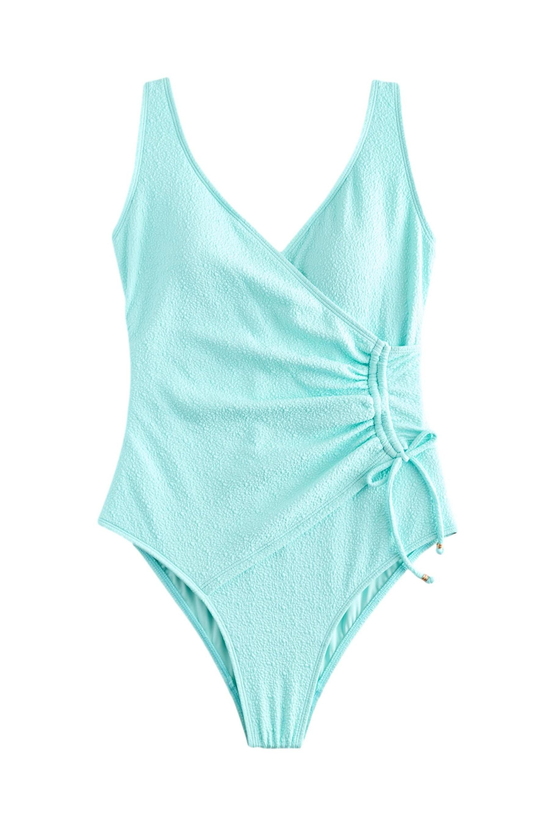 Next Badeanzug Bauchformender Badeanzug mit seitlicher Raffung (1-St) günstig online kaufen