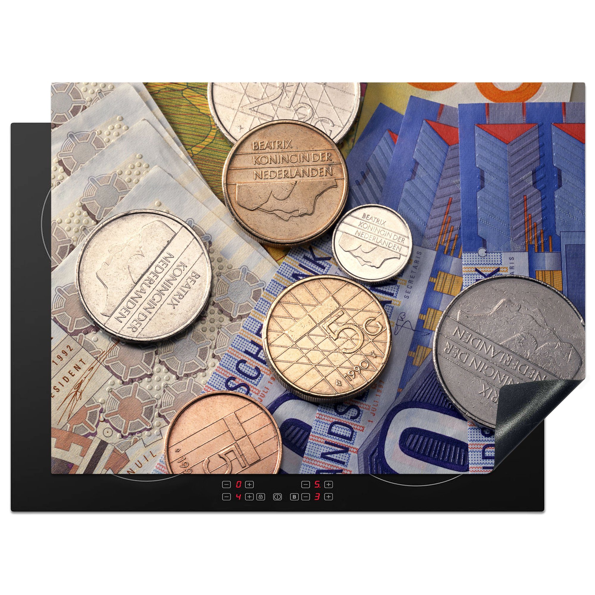 MuchoWow Herdblende-/Abdeckplatte Eine Sammlung von niederländischen Gulden in Form von Münzen und, Vinyl, (1 tlg), 70x52 cm, Mobile Arbeitsfläche nutzbar, Ceranfeldabdeckung