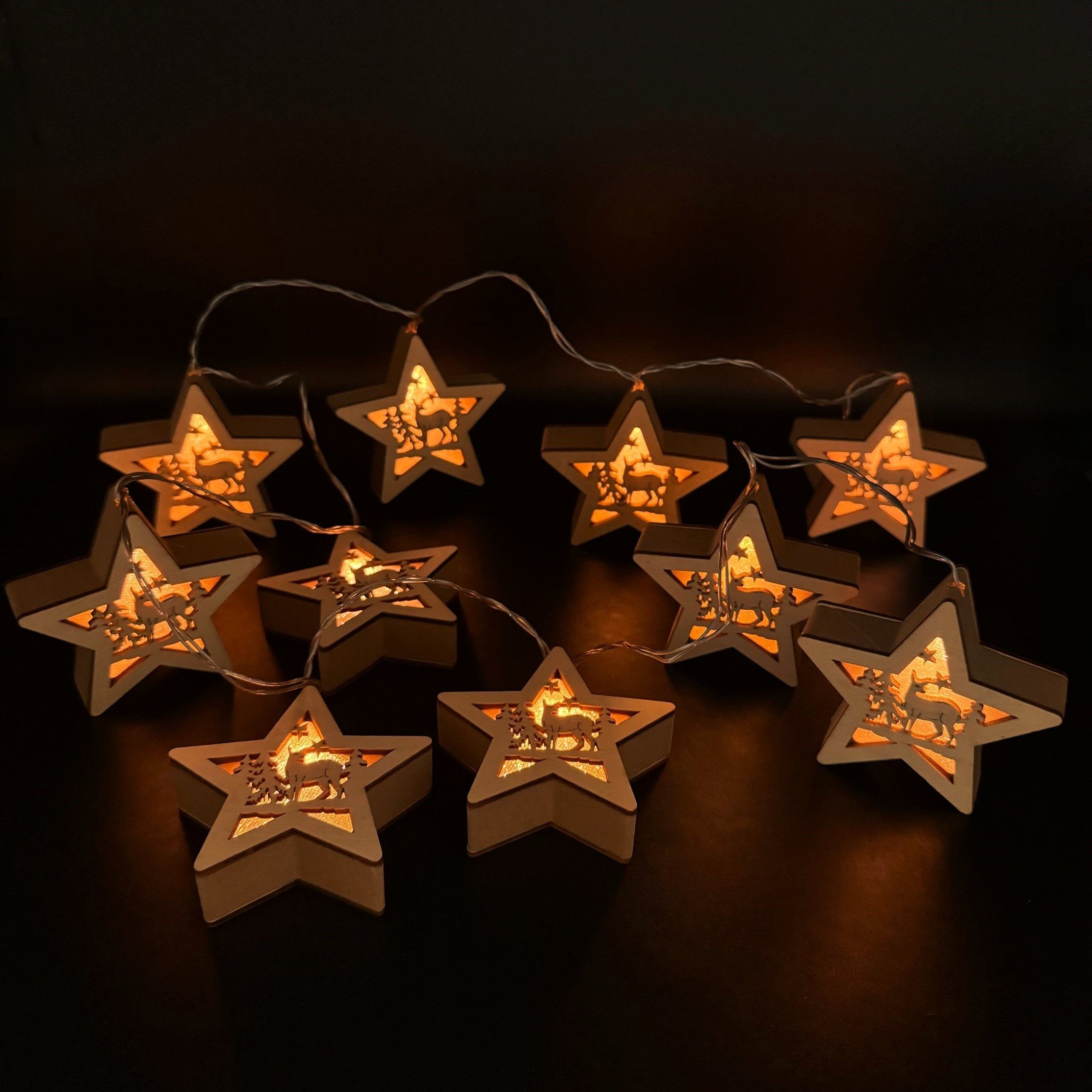Online-Fuchs LED-Lichterkette mit 10 großen Holzsternen, Hologrammfolie und 6-Stunden Timer, Batteriebetrieben, für Innen, Weihnachten - Weihnachtsdeko