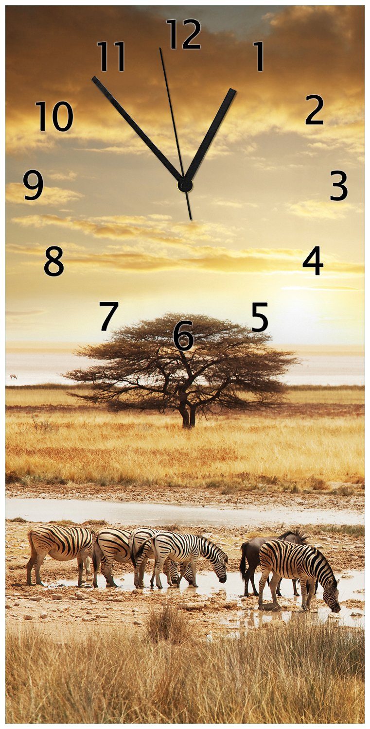 Wallario Wanduhr Safari in Afrika eine Herde Zebras am Wasser (Uhr aus Acryl)