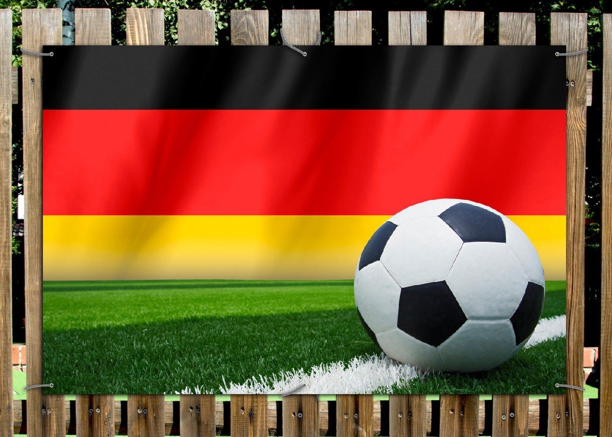 Thumbnail - Wallario Sichtschutzzaunmatten Fußball vor einer Deutschlandflagge