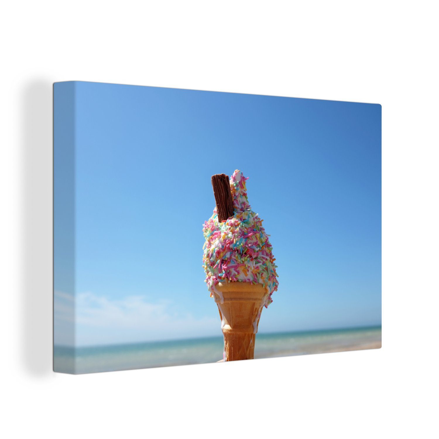 OneMillionCanvasses® Leinwandbild Geschmolzenes Eis mit Flecken am Strand, (1 St), Wandbild Leinwandbilder, Aufhängefertig, Wanddeko, 30x20 cm