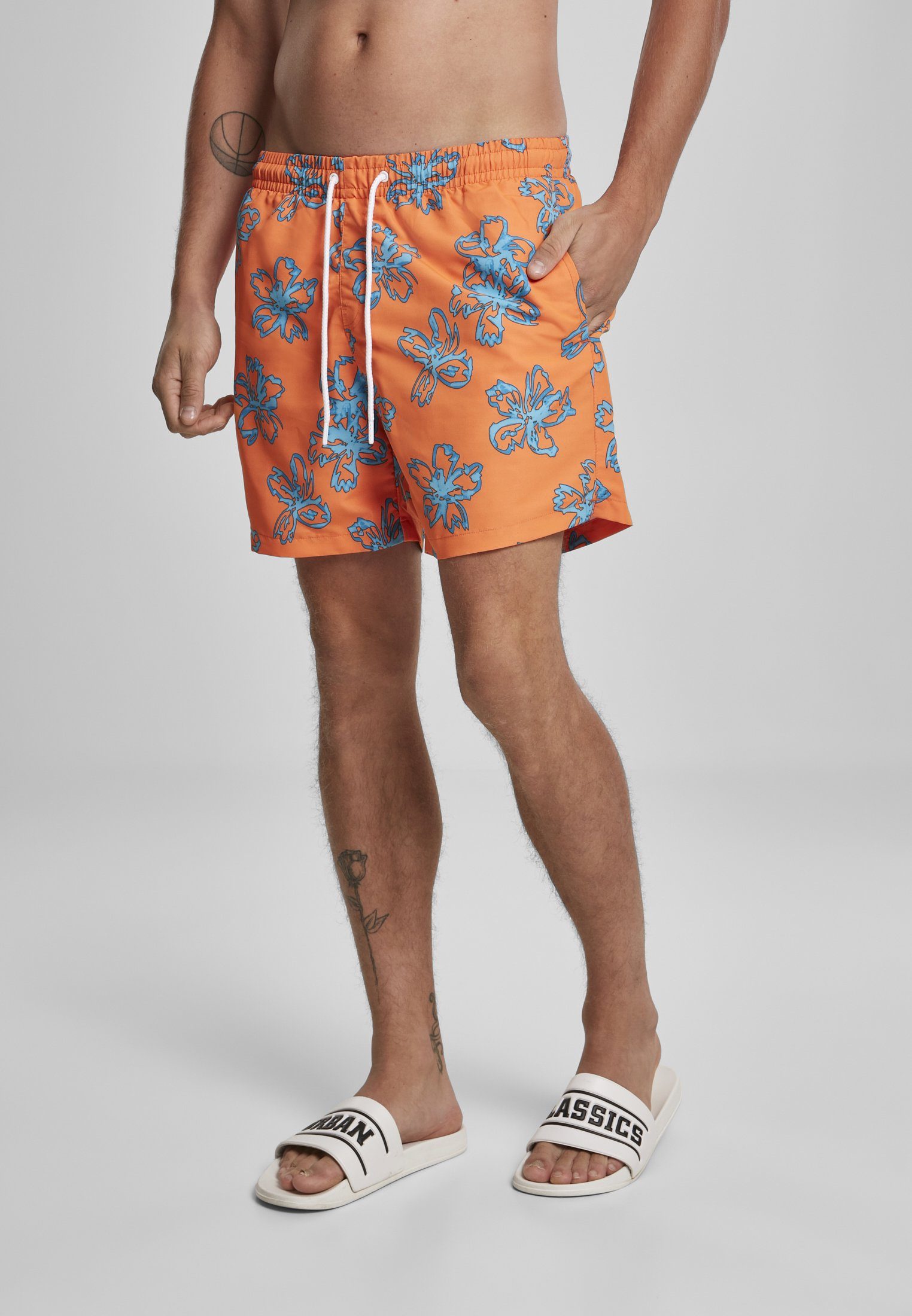 URBAN CLASSICS Badeshorts Herren Floral Swim Shorts orange | Badeshorts