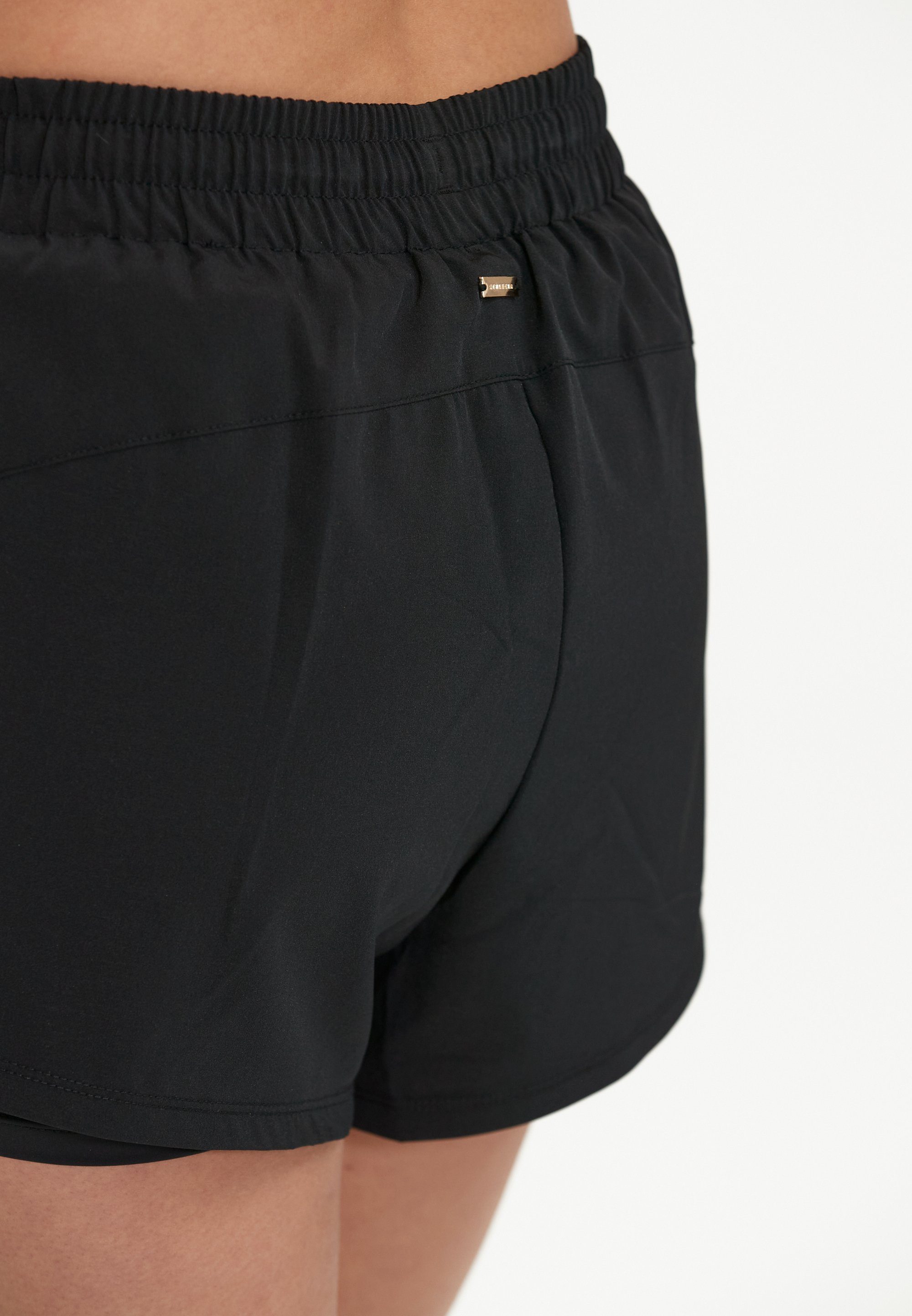 praktischen Timmie mit Shorts ATHLECIA schwarz Seitentaschen