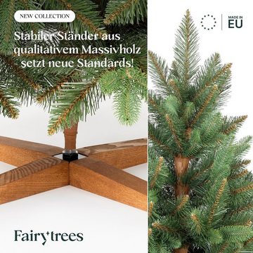 Fairytrees Künstlicher Weihnachtsbaum FT29, Nordmanntanne Premium, mit braunem Stamm und Echtholz Baumständer
