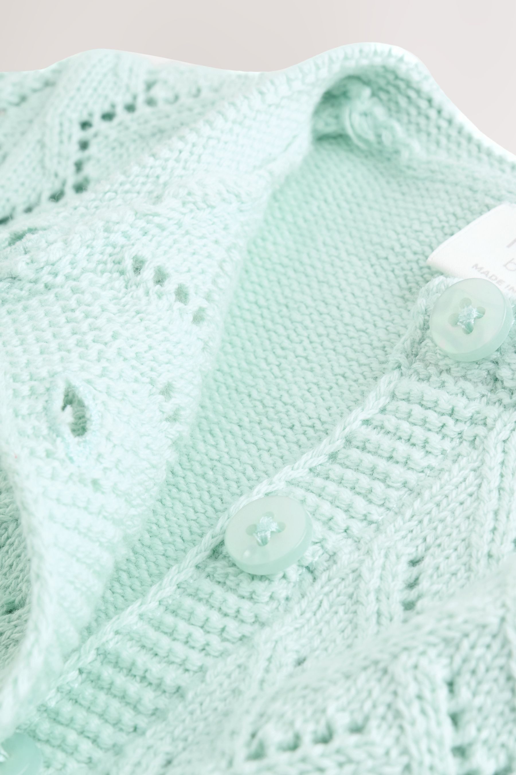 Next Strickjacke Strickjacke mit Lochmuster für Babys (1-tlg)