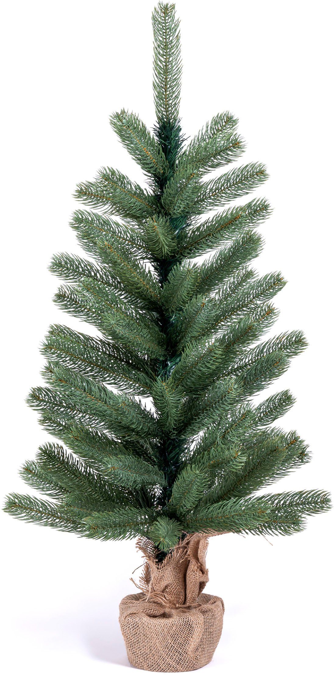 IC Winterworld Künstlicher Weihnachtsbaum Tannenbaum, künstlicher Christbaum, Nordmanntanne, Weihnachtsdeko mit Jutebeutel um den Betonfuß – Bild 5 von 5