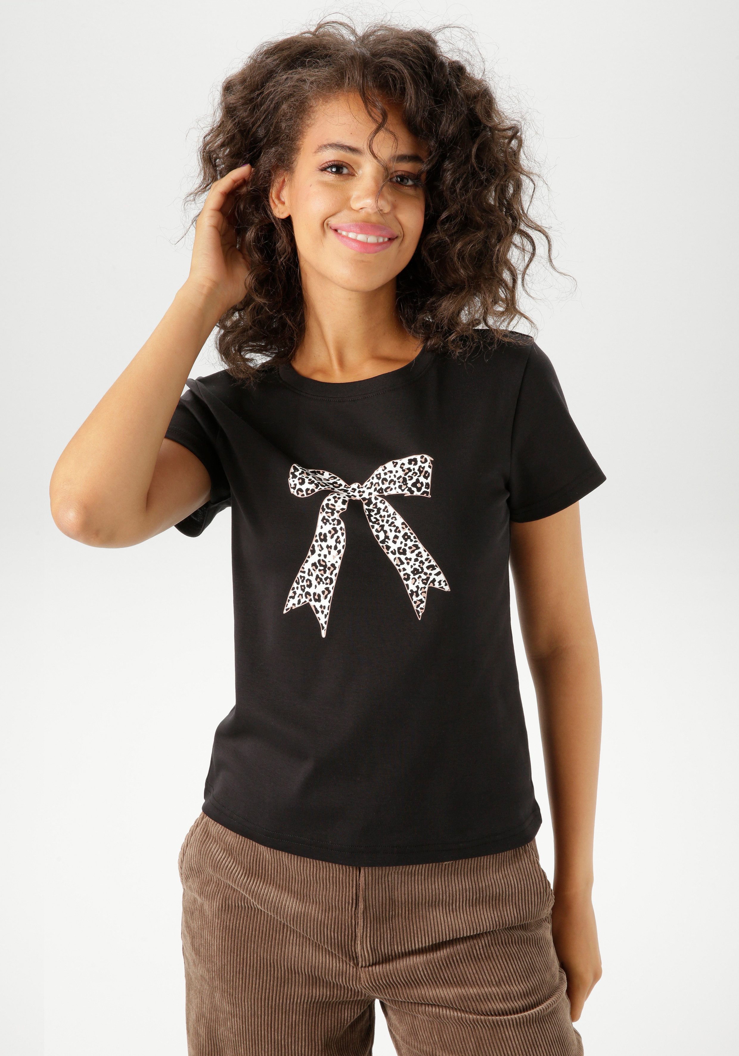 Aniston CASUAL T-Shirt mit Schleife im Leo-Dessin bedruckt günstig online kaufen