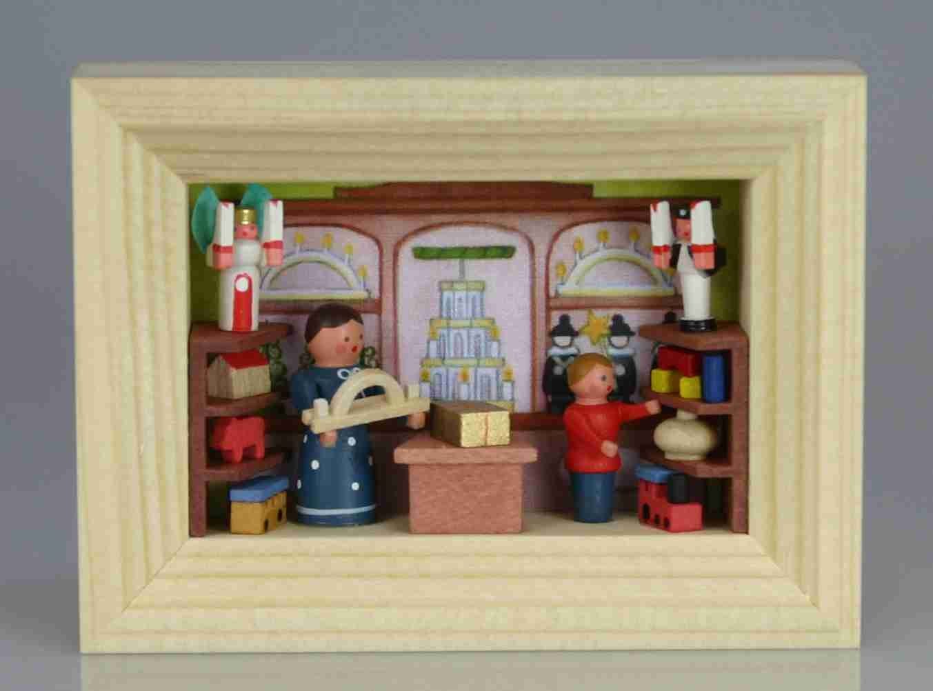 Stübelmacher Gunter Flath Weihnachtsfigur Miniatur im Rähmchen Spielzeugladen