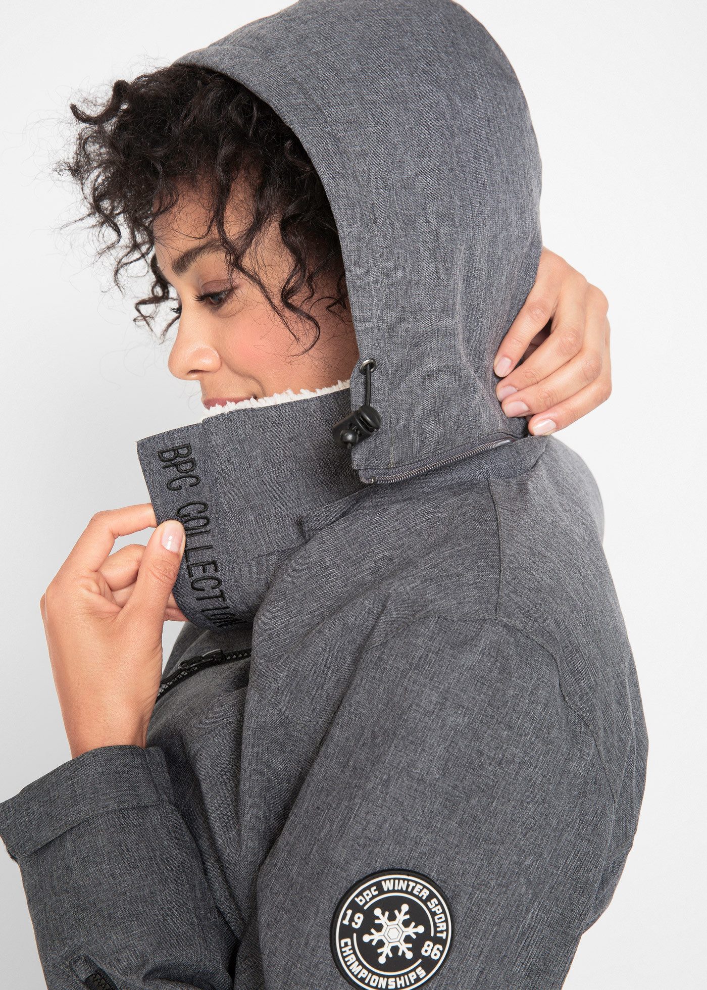 bonprix Funktionsjacke mit Teddyfleece-Futter, wind- und wasserdicht, mit hohem Stehkragen