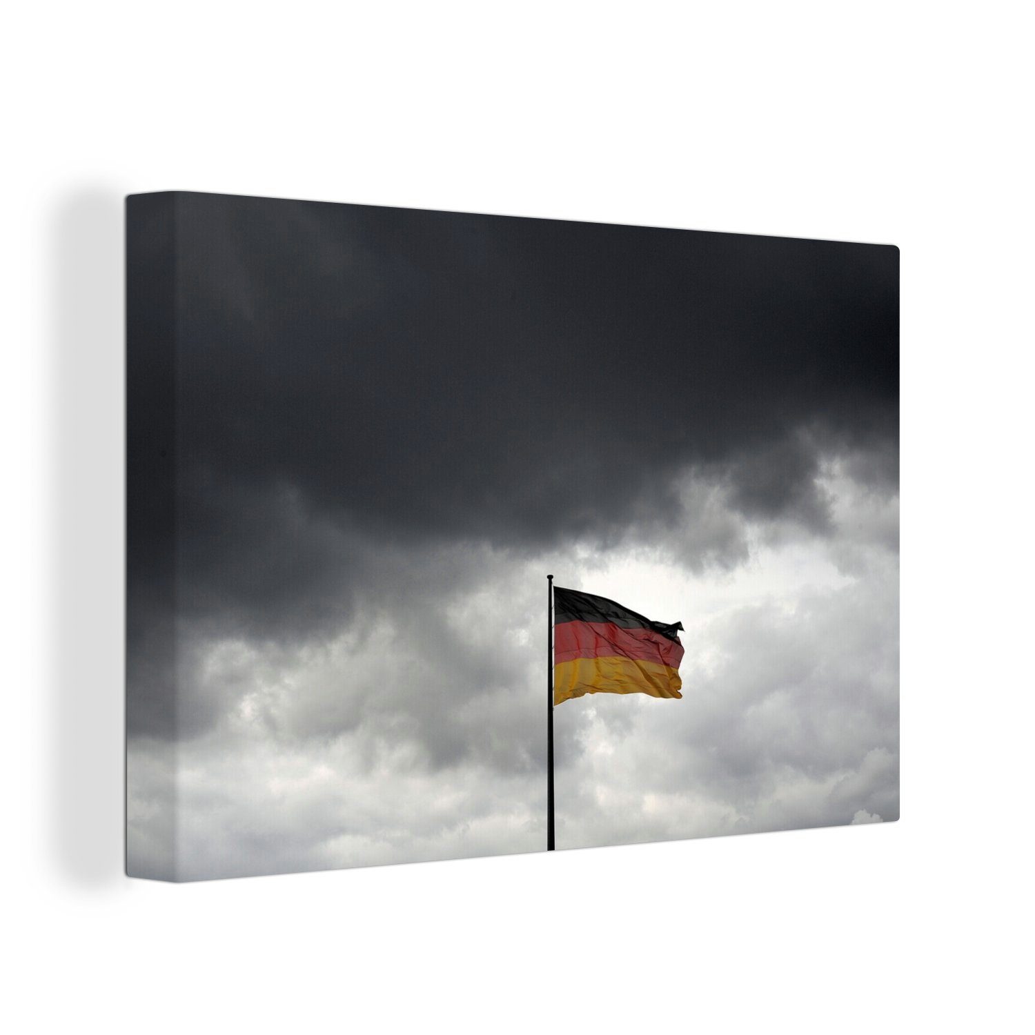 OneMillionCanvasses® Leinwandbild Deutsche Flagge in Berlin vor dunklen Wolken, (1 St), Wandbild Leinwandbilder, Aufhängefertig, Wanddeko, 30x20 cm