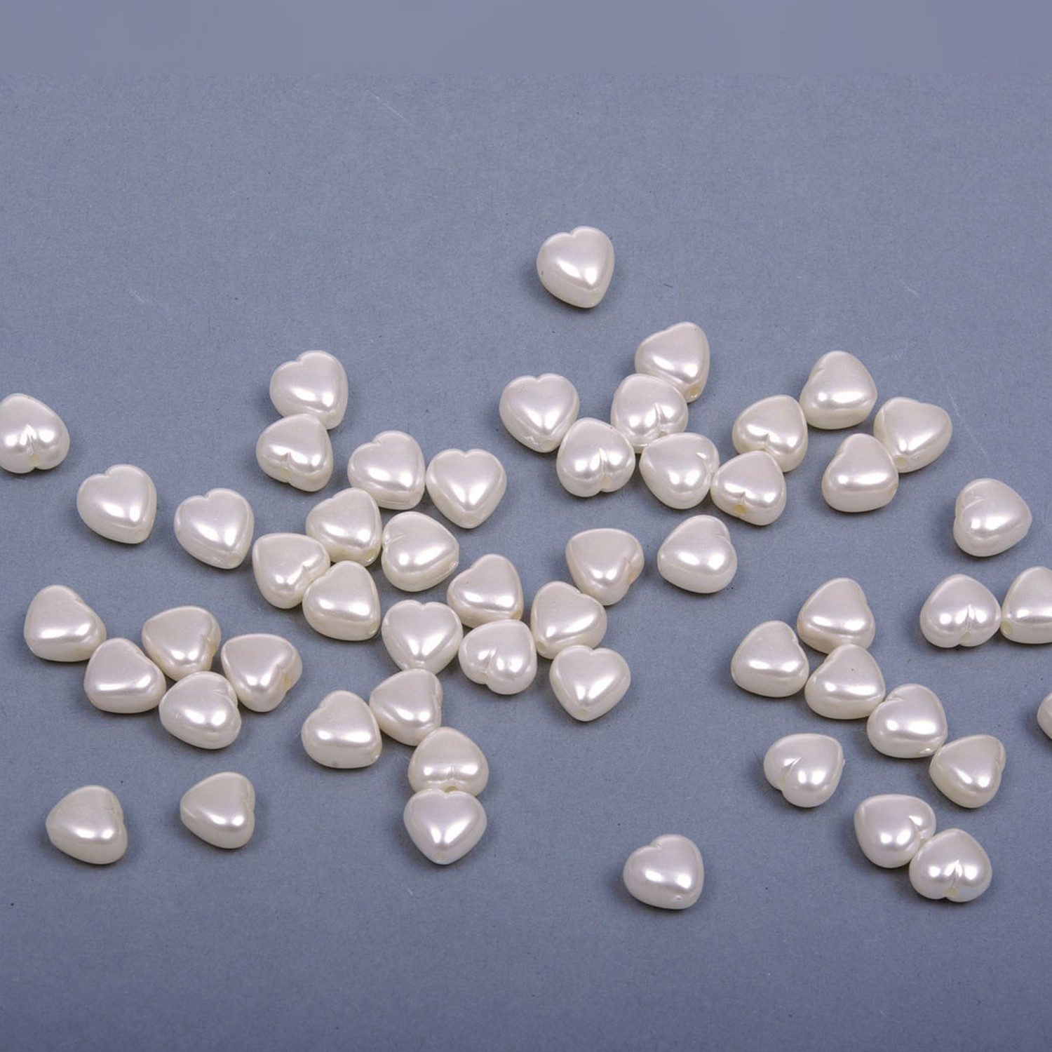 Deko AS Streudeko Miniherzen mit Loch zum Auffädeln - Streudeko - Hochzeit - 10 mm - cr