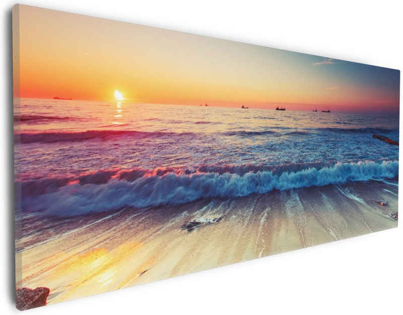Wallario Leinwandbild, Sonnenuntergang am Meer mit Wellen am Strand, in verschiedenen Ausführungen