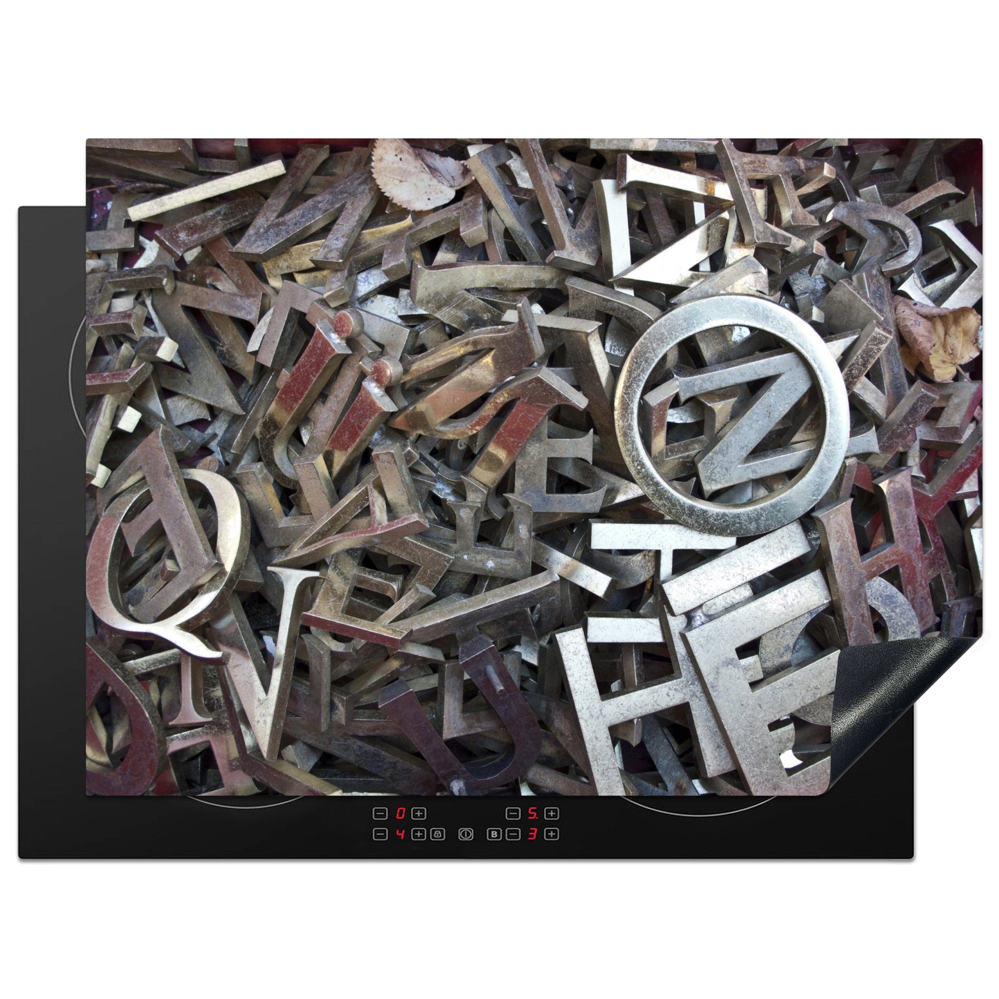 MuchoWow Herdblende-/Abdeckplatte Metallbuchstaben auf einem Stapel, Vinyl, (1 tlg), 71x52 cm, Induktionskochfeld Schutz für die küche, Ceranfeldabdeckung