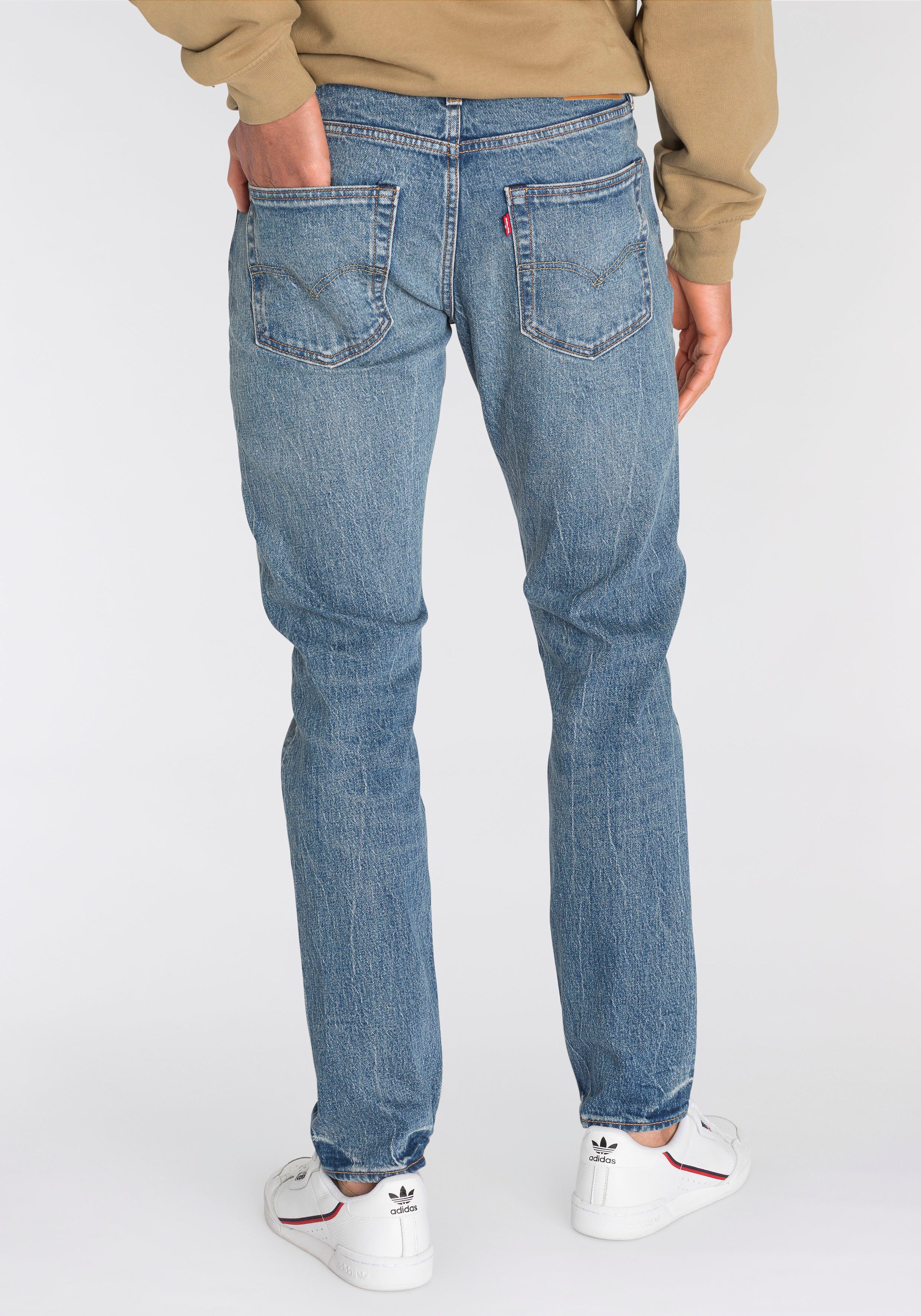 Levi's® Tapered-fit-Jeans 512 IT mit Fit Taper MONEY Markenlabel BAG Slim