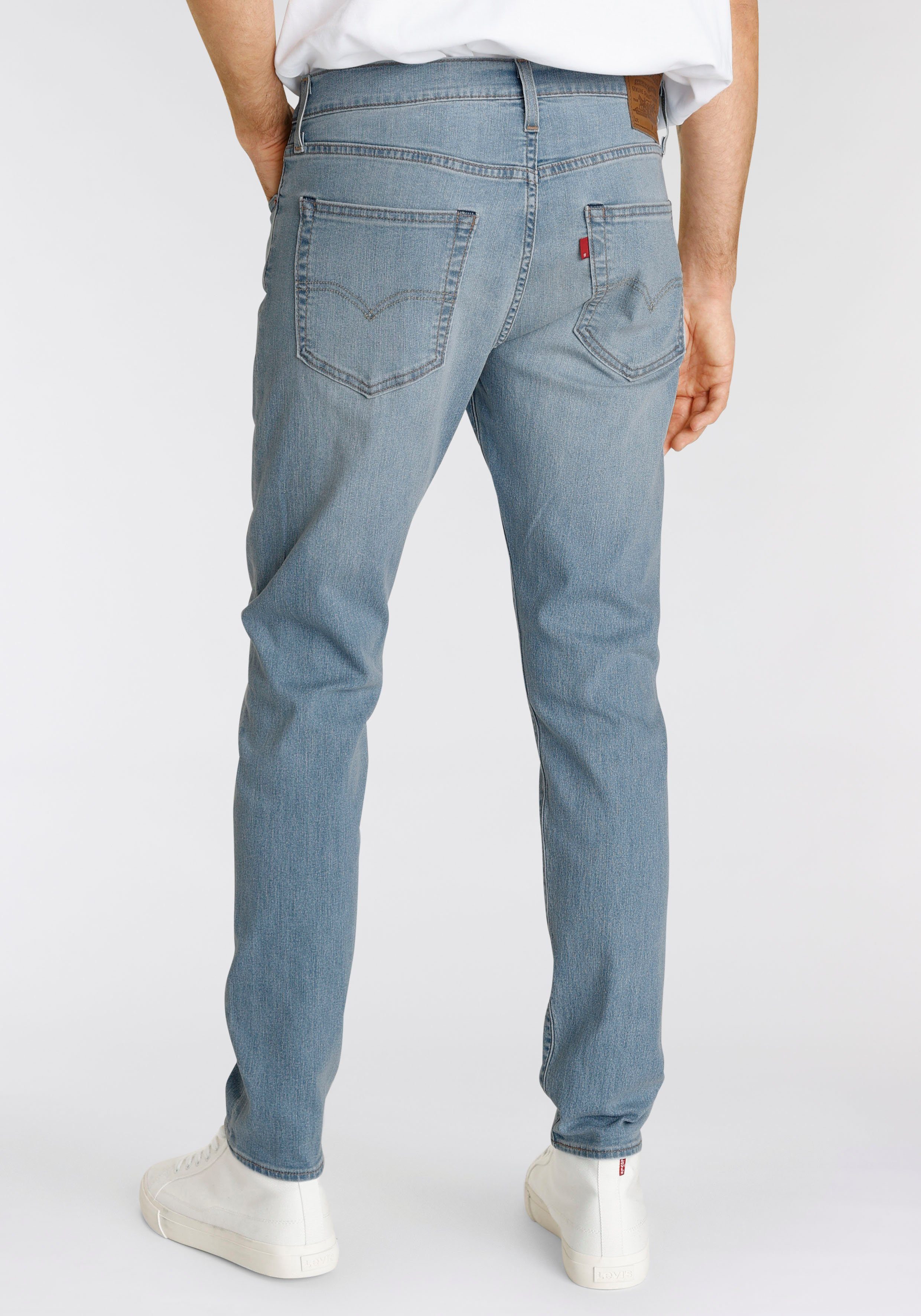 in medium mit indigo Markenlabel Taper 512 worn Tapered-fit-Jeans Fit Levi's® Slim