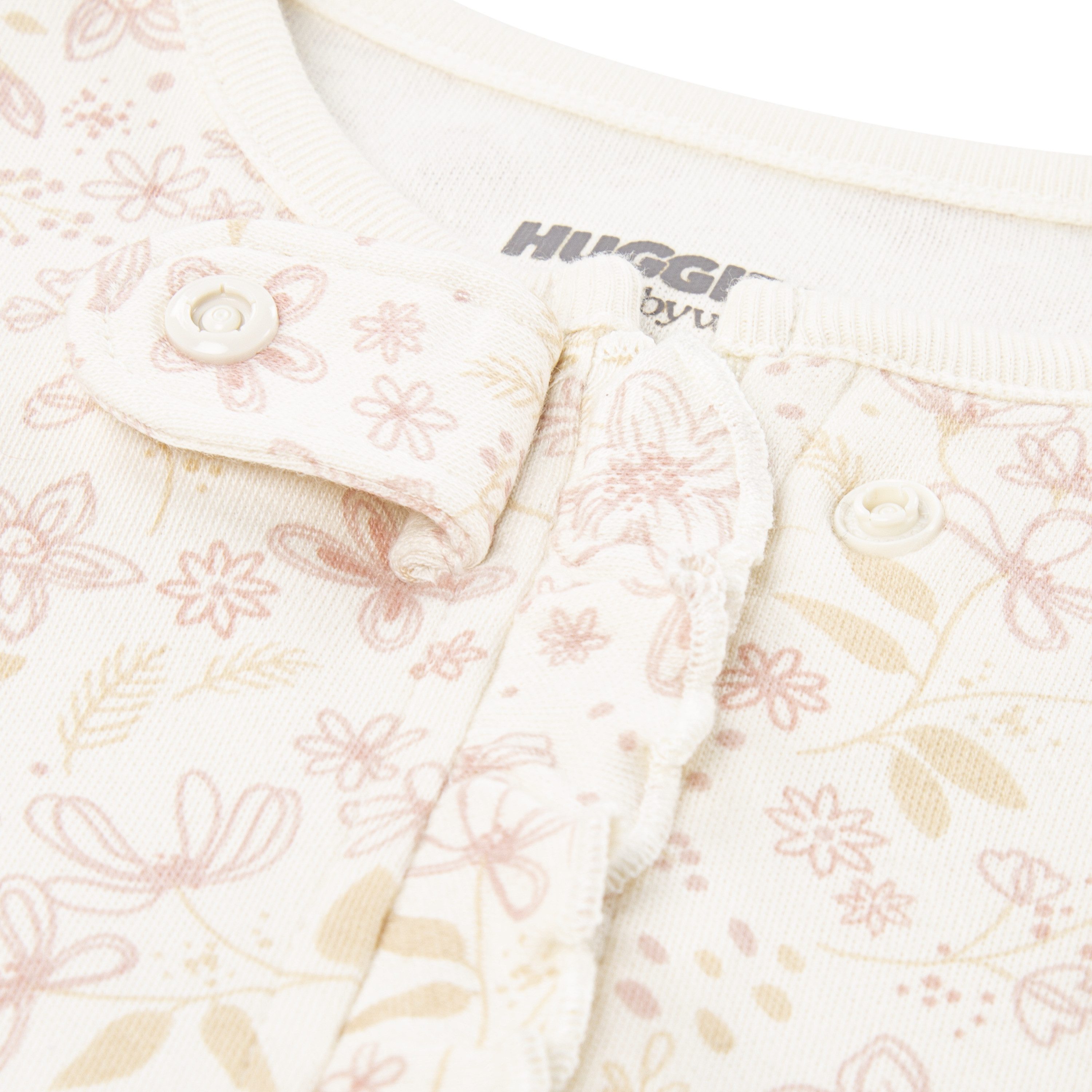 HUGGIES babywear Strampler HUGG FOOTED COVERALL Verdeckter Reißverschluss mit Kinnschutz und floralem Muster