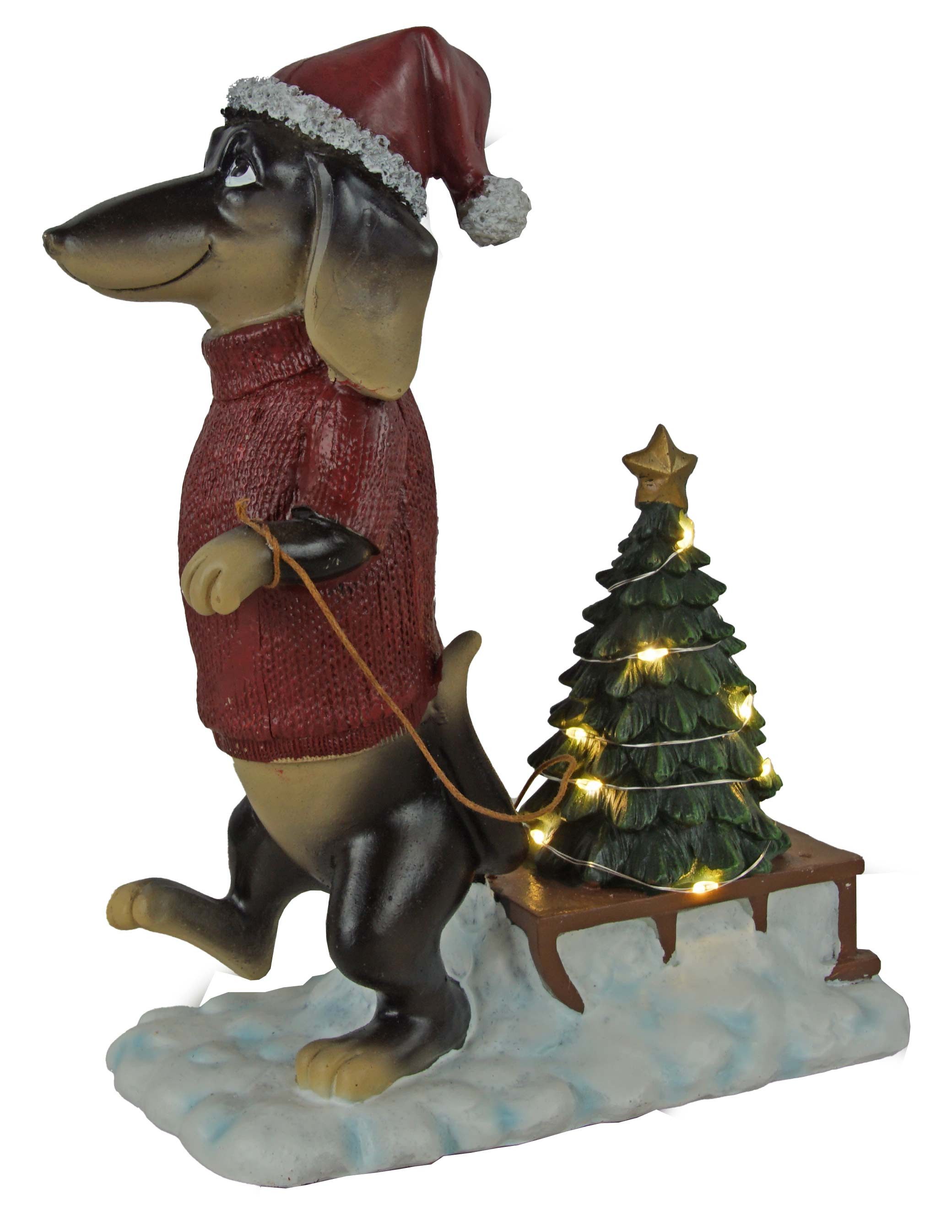 Eurosouvenir LED-Dekofigur Weihnachtszauber auf vier Pfoten: Dackel mit Weihnachtsbaum-Schlitten (1 St), Weihnachtsfigur
