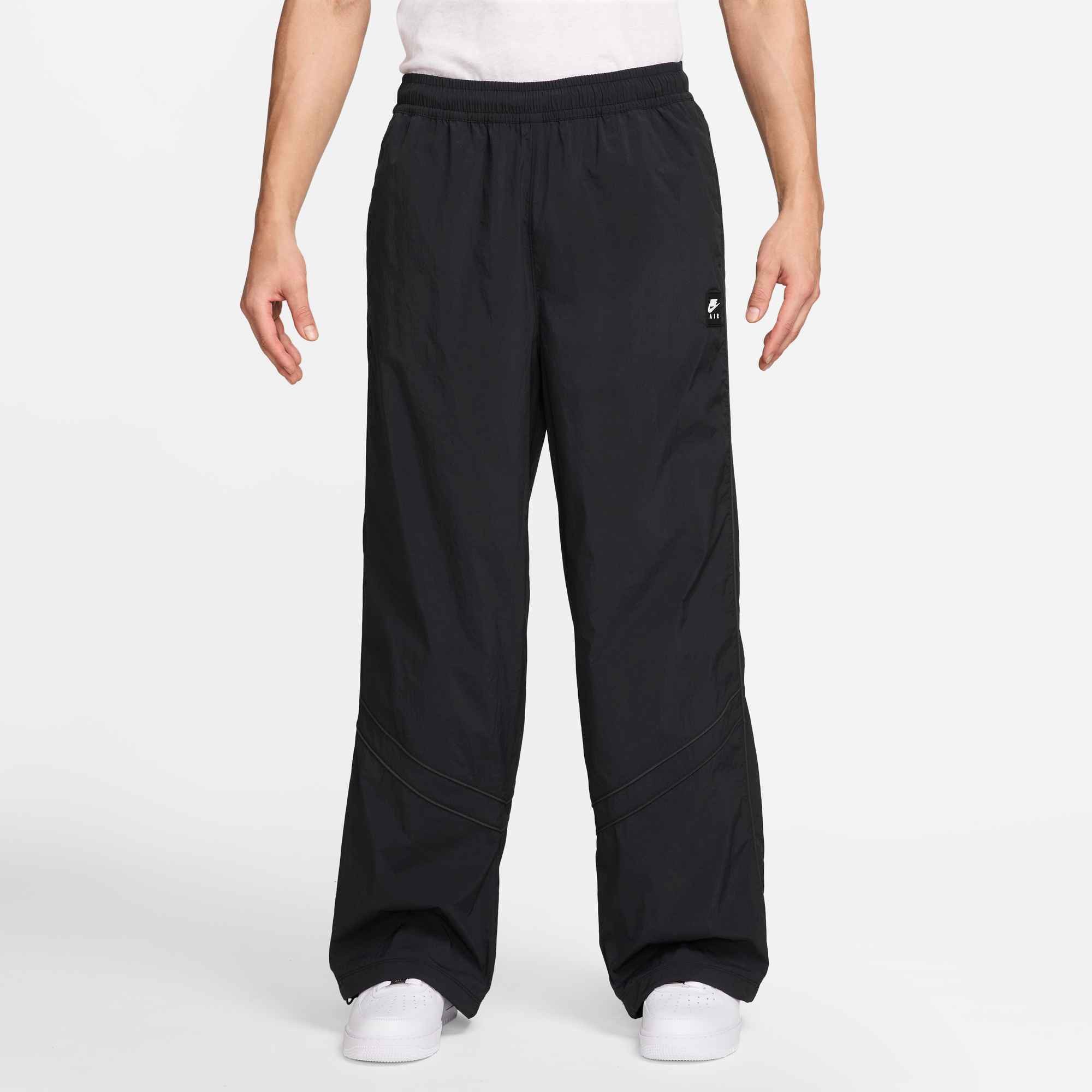 Nike Sportswear Sporthose Nike Sportswear Air Men's Track Pants wasserabweisendes Taftgewebe, mit Netzfutter, geräumige Passform, Ansicht 1