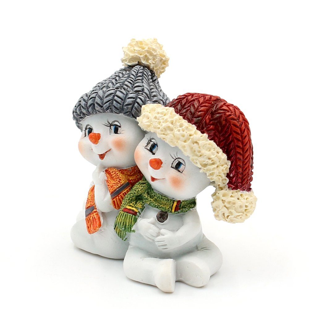 Dekohelden24 Dekofigur Schneekinderpaar als 2er Set, mit Mütze und Schal, in rot, grau, orange und grün, sitzend L/B/H 5,5 x 3,5 x 5,5 cm – Bild 3 von 5