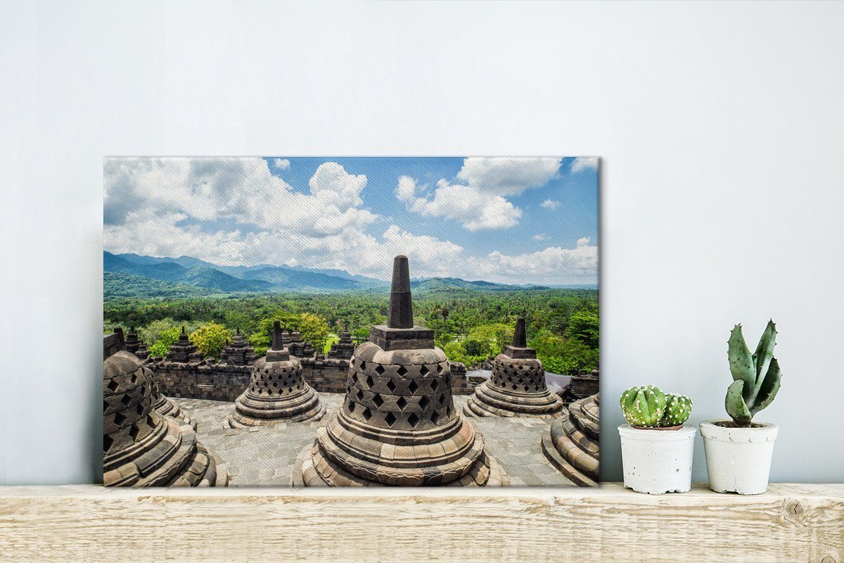 OneMillionCanvasses® Leinwandbilder, Borobudur-Tempel, cm Leinwandbild Wolken dem Aufhängefertig, (1 30x20 St), Weiße Wandbild Wanddeko, über