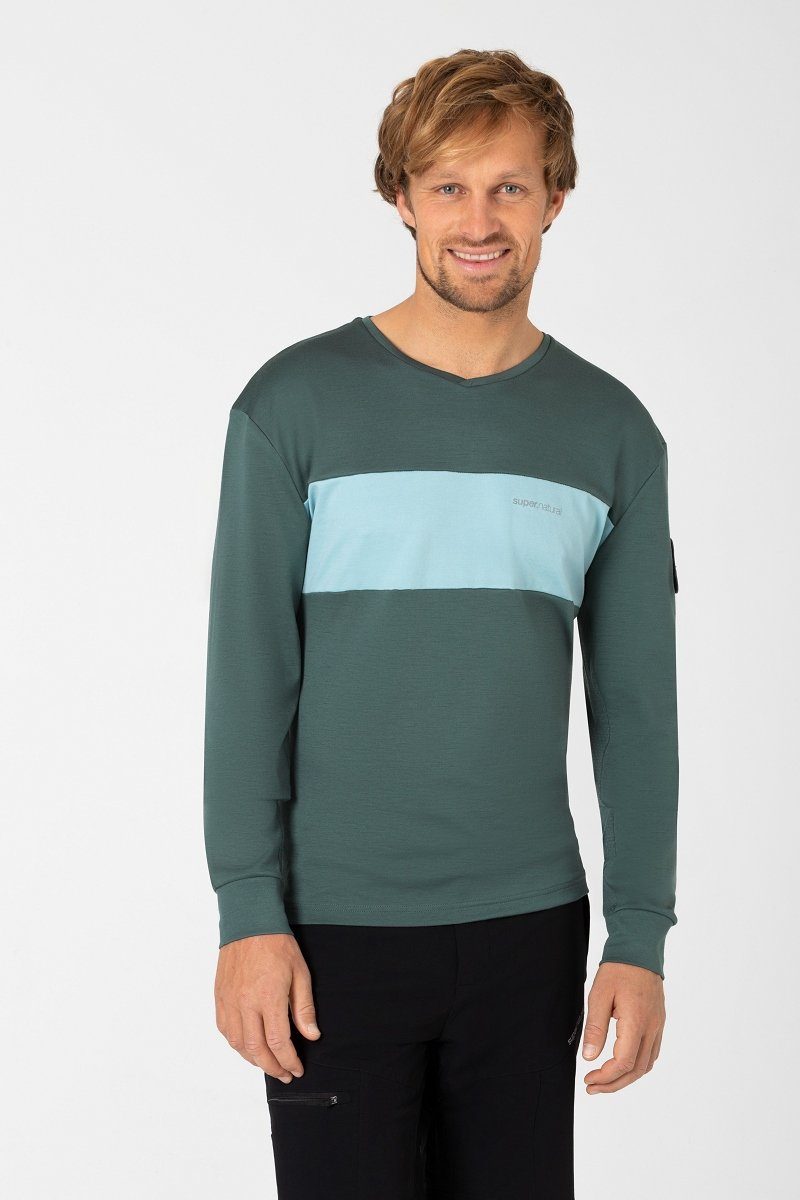SUPER.NATURAL Radtrikot Merino Fahrradtrikot M GRAVIER LS Merino-Materialmix mit reflektierenden Logos