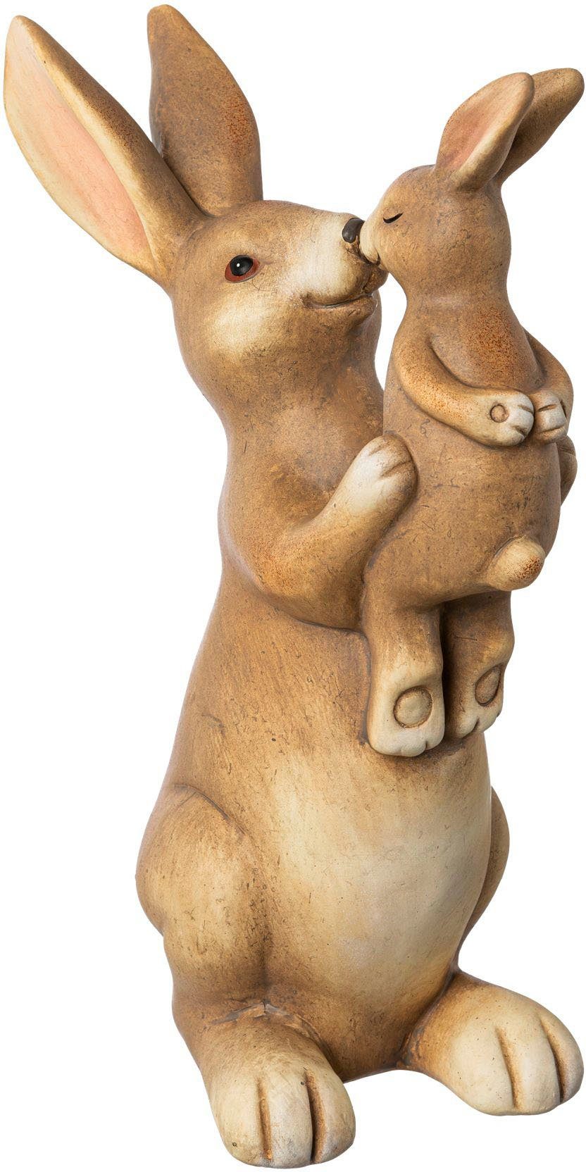 Creativ home Osterhase St), Keramik, Hase mit cm (1 25 Gesicht aus fröhlichem Höhe Osterdeko
