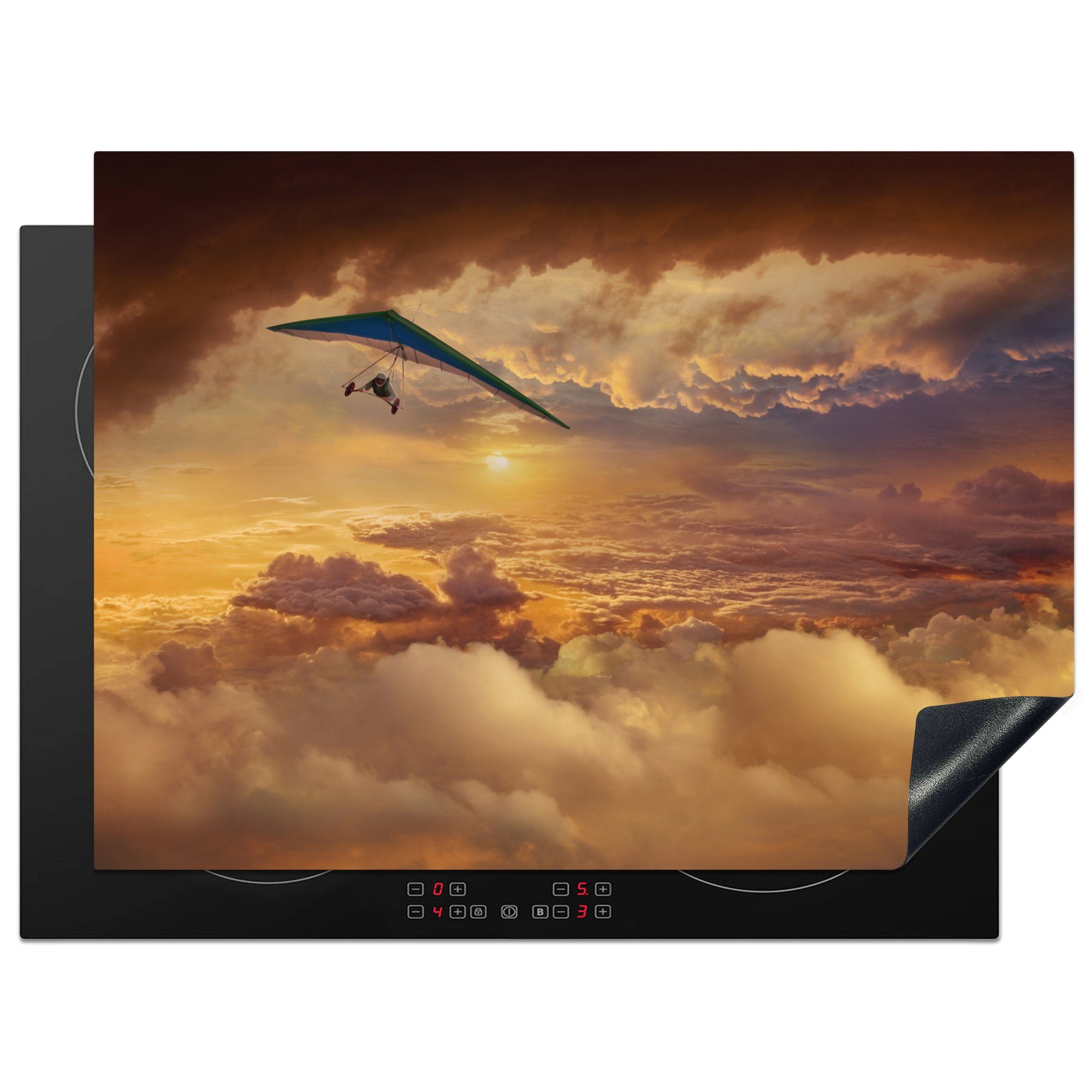 MuchoWow Herdblende-/Abdeckplatte Eine Frau beim Gleitschirmfliegen zwischen den orangefarbenen Wolken, Vinyl, (1 tlg), 70x52 cm, Mobile Arbeitsfläche nutzbar, Ceranfeldabdeckung