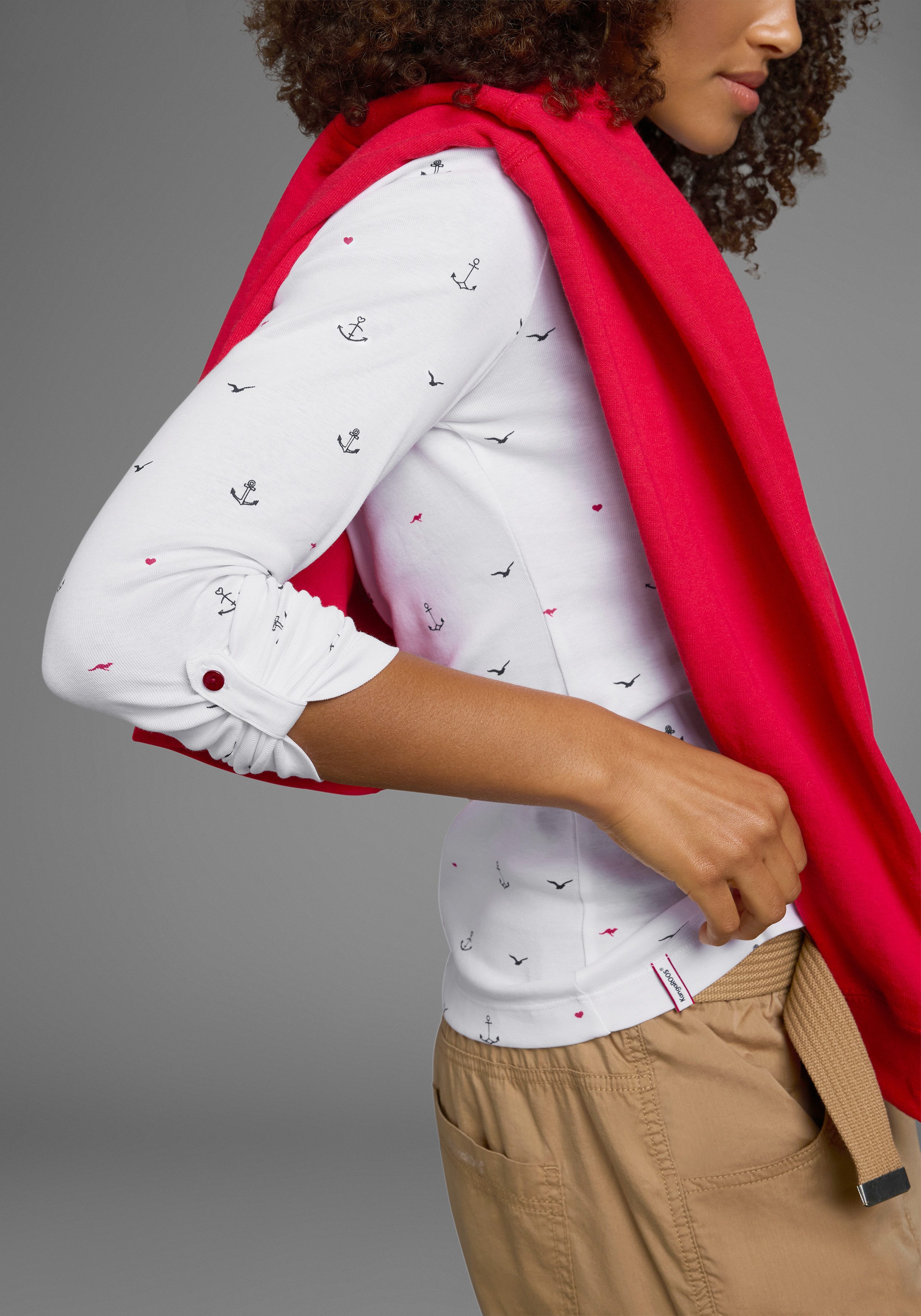 KangaROOS Langarmshirt krempelbare Ärmel, sehr figurbetont, aus elastischer Rippware