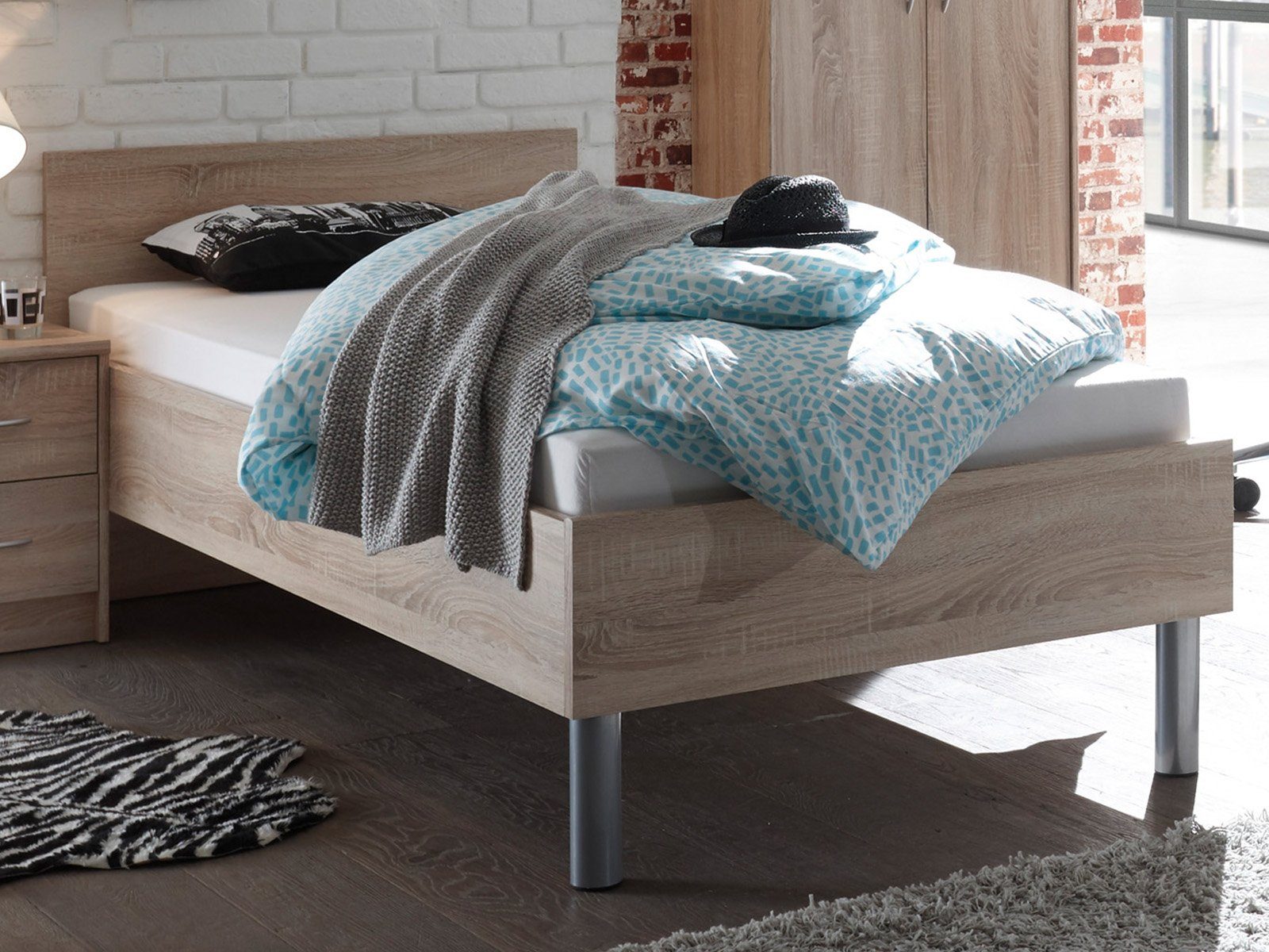 möbelando Bett »Olli«, Modernes Bett aus Spanplatte in Sonoma-Eiche  Nachbildung. Liegefläche 90x200 cm. Breite 96 cm, Höhe 76 cm, Tiefe 206 cm